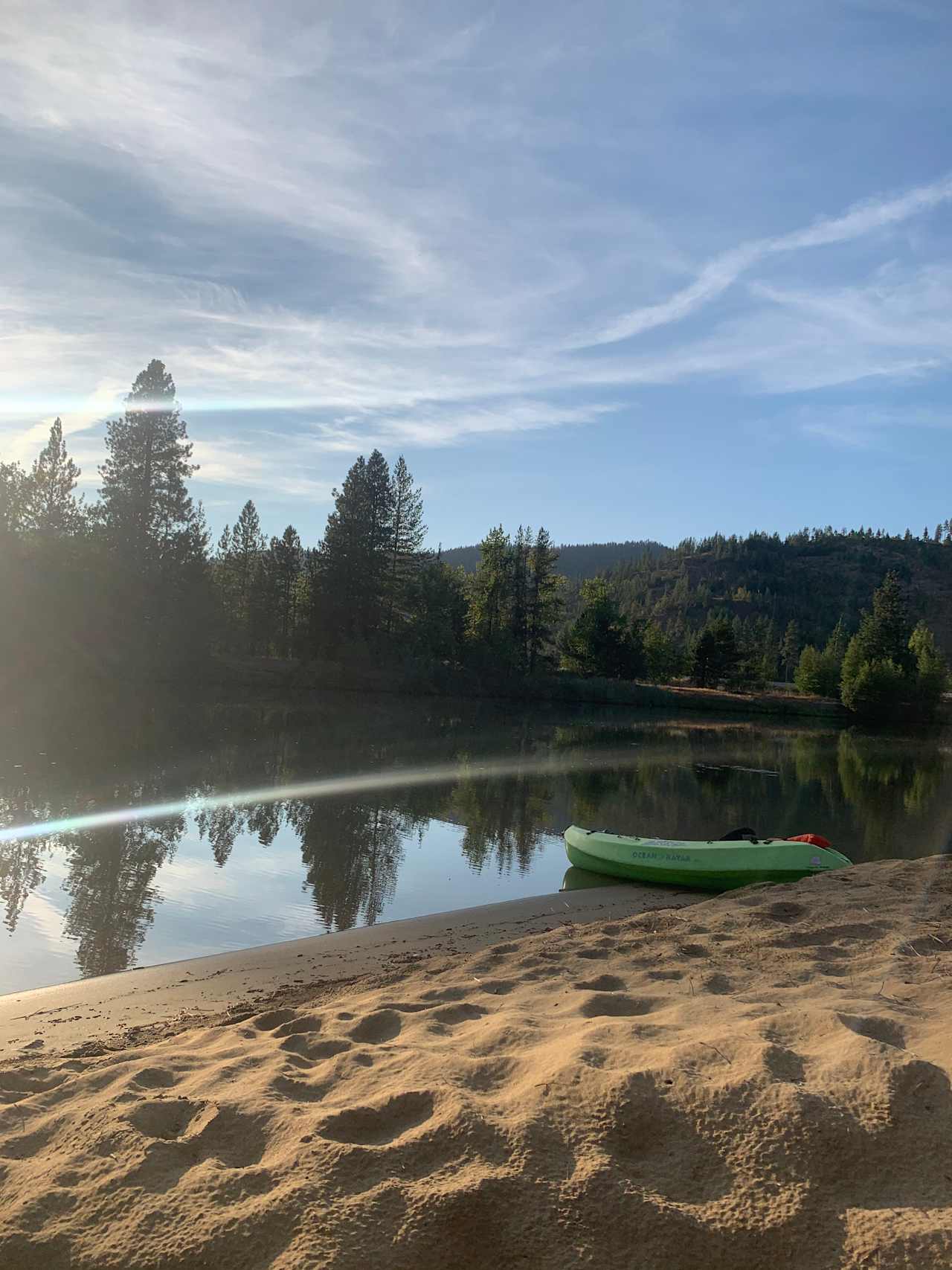 Amazing soft sand. The campsite is across the river in the background. Kayak, canoe, or swim (with caution).