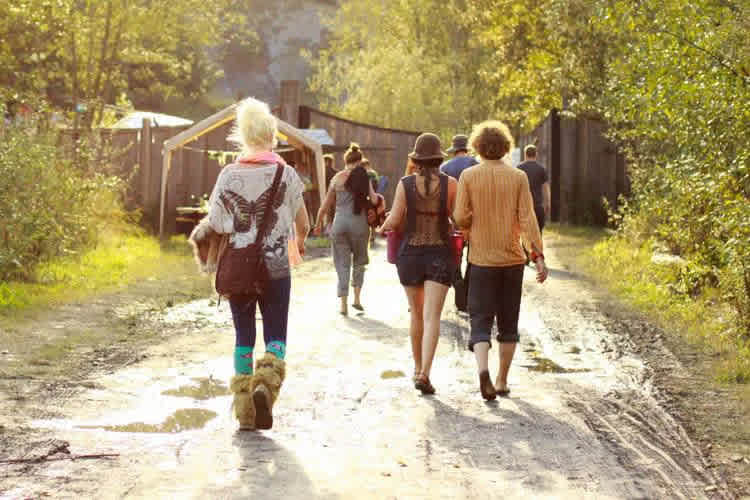 In the way to the Grounds. Friends walking through entrance gate. <3