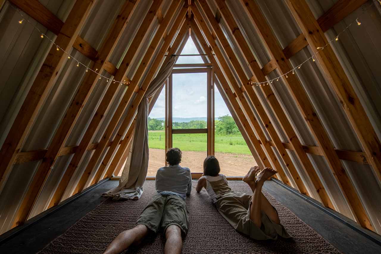Sleep under the stars overlooking the mountains by babbling stream