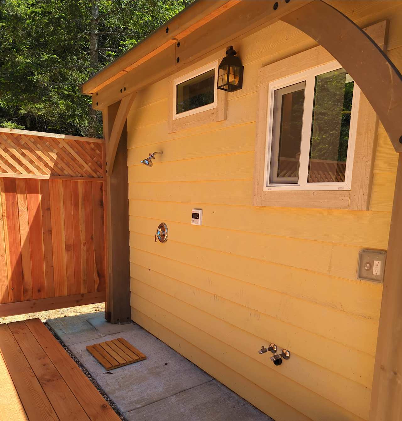Outdoor hot shower right next to the 8 person cedar hot tub.