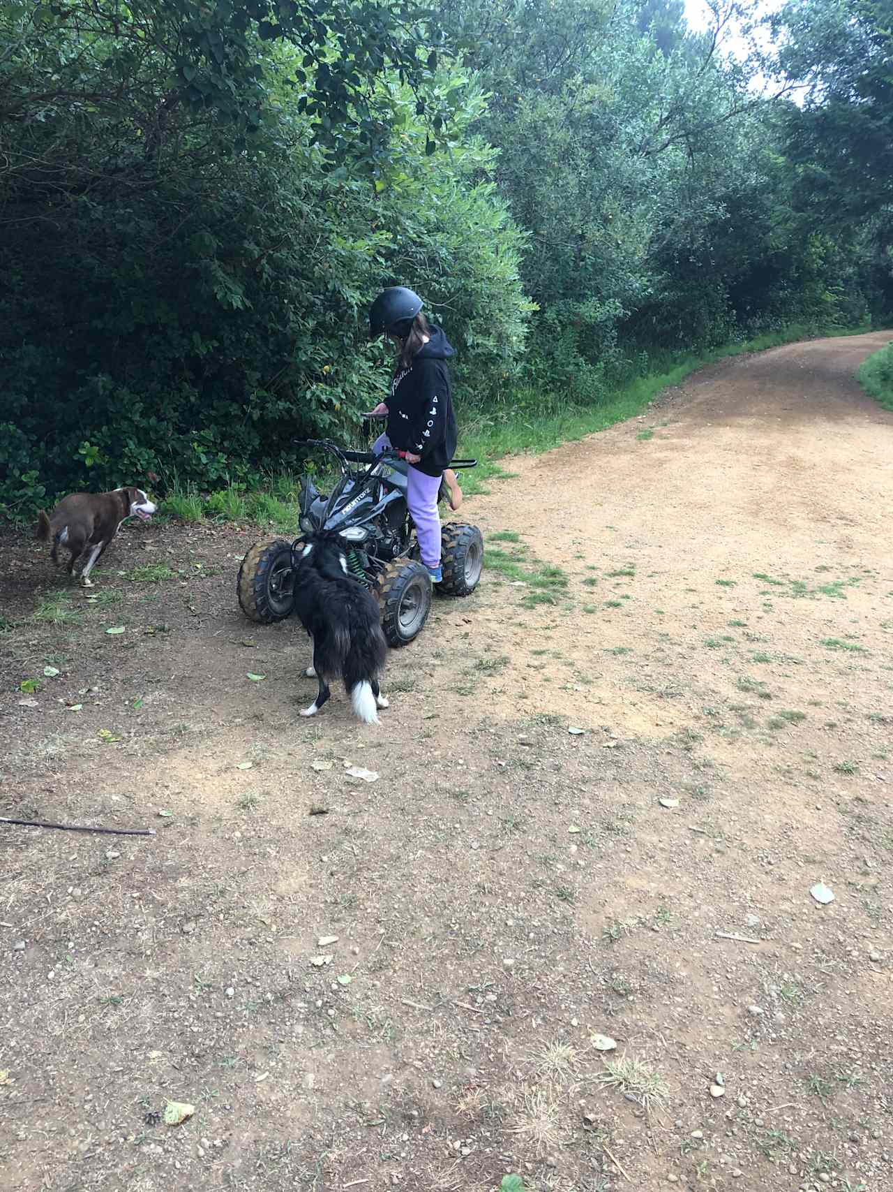 Grand daugher learning to ride a quad