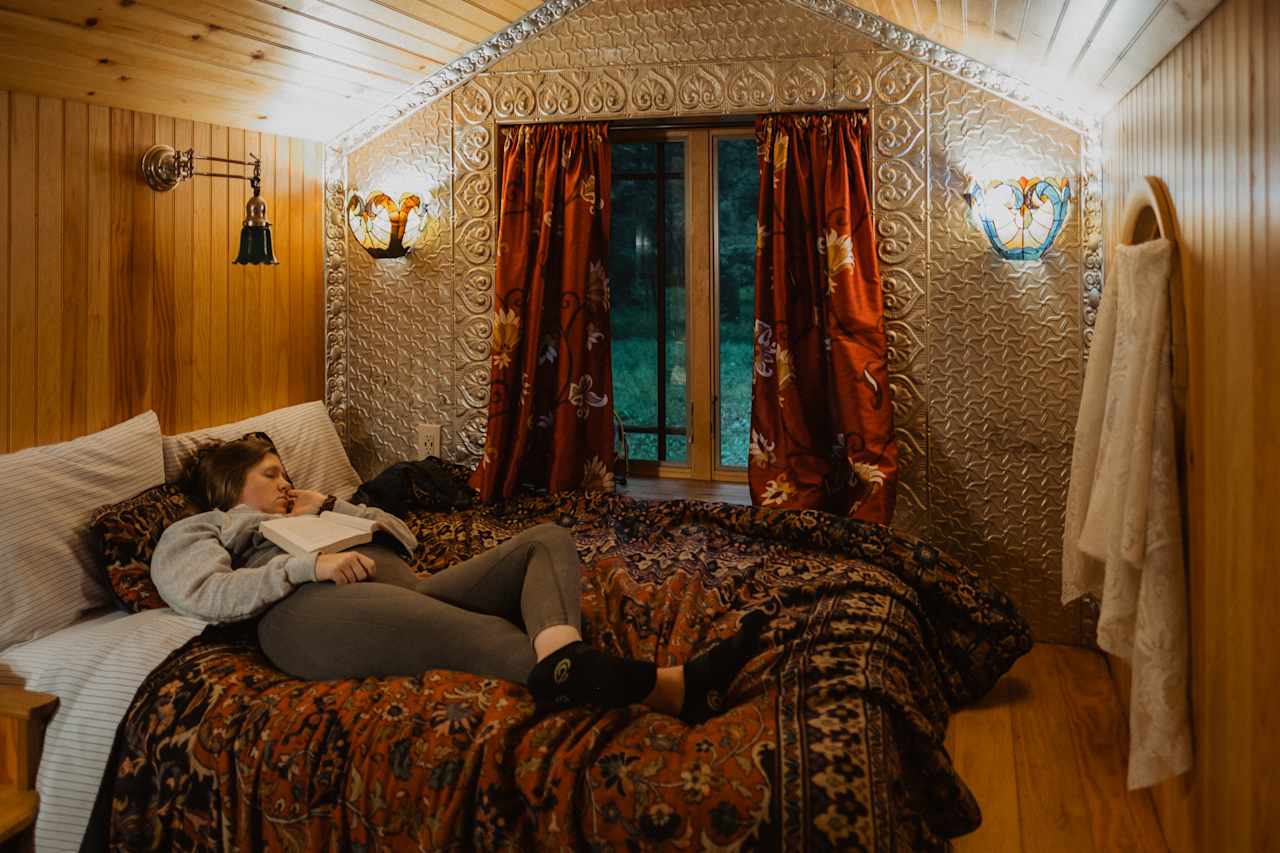 The most comfortable and cozy full-sized bed is the star of the tiny home