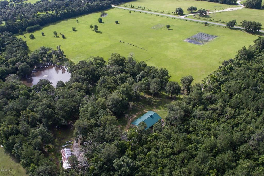 AERIAL VIEW 40 acres of peaceful bliss. All organic farm, now chemicals, fertilizers, filtered drinking water, hot showers, etc.