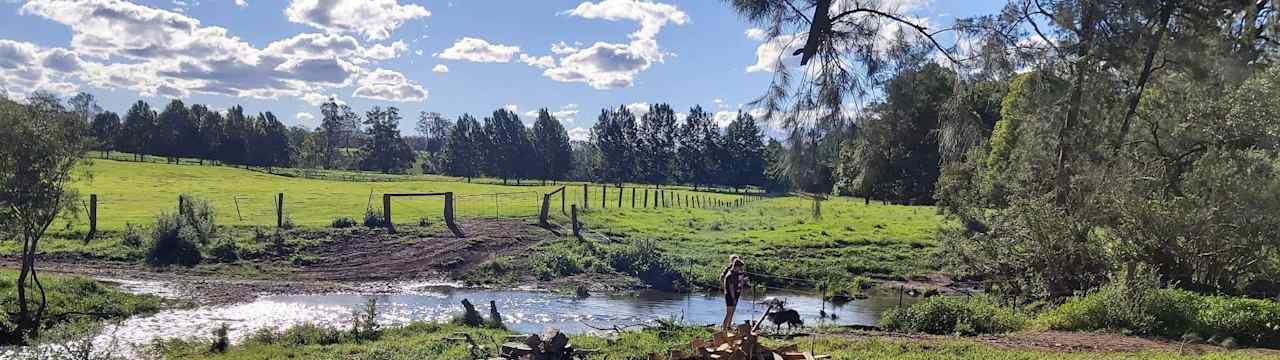 Camp sites along creek edge on right side of fence. Access via steep incline 4wd recommended