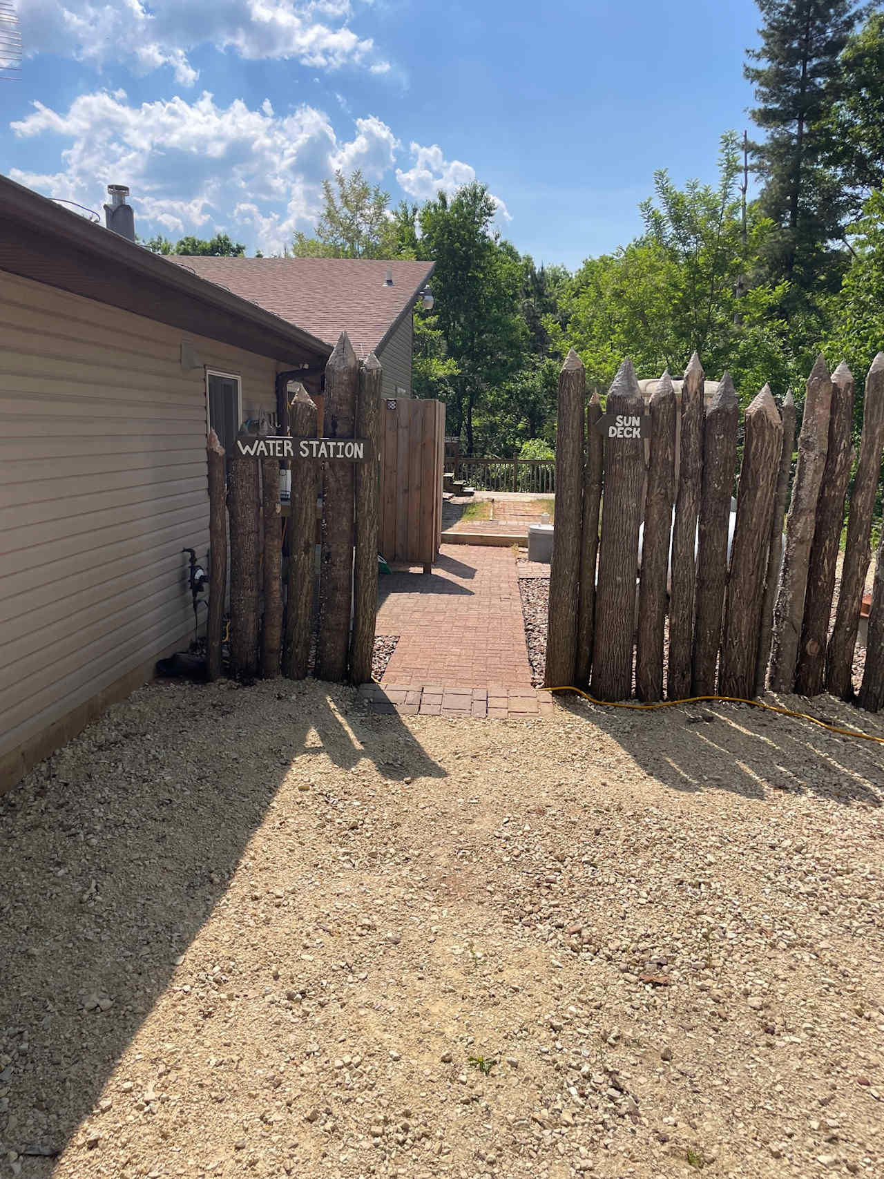Water Station entrance which provides fresh water, sink, portable bathroom and outdoor shower.  This is also the access point to the Sun Deck