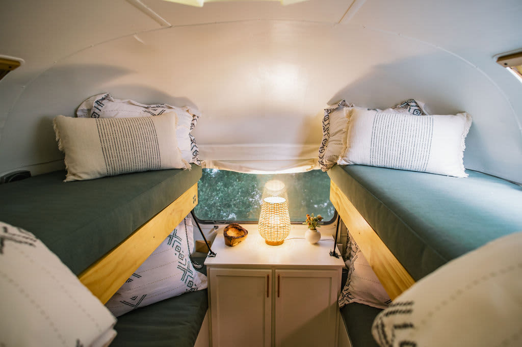 Bunk beds. Only the bottom bunks are stable enough to hold people over 100lb. Please do not use top bunks. 