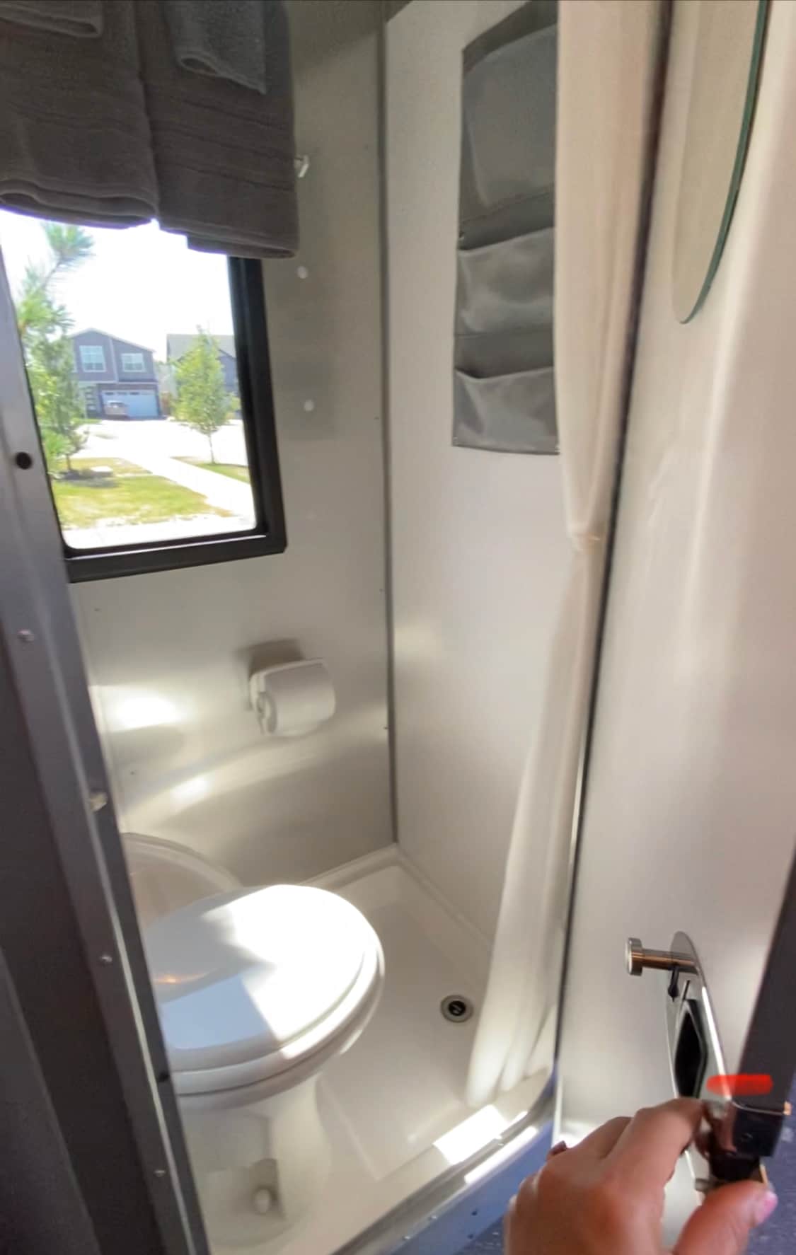 Wet bath with a shower. 