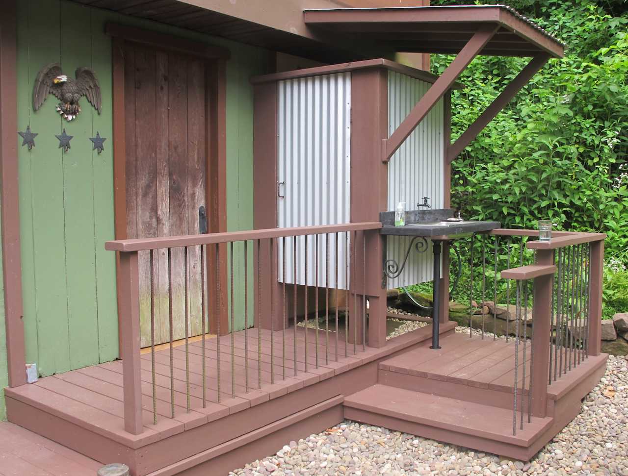 Outdoor shower with on demand hot water.