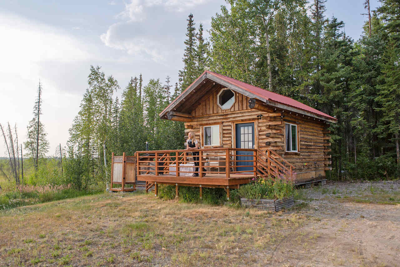The cabin perfectly situated on the egde of the trees and meadow.
