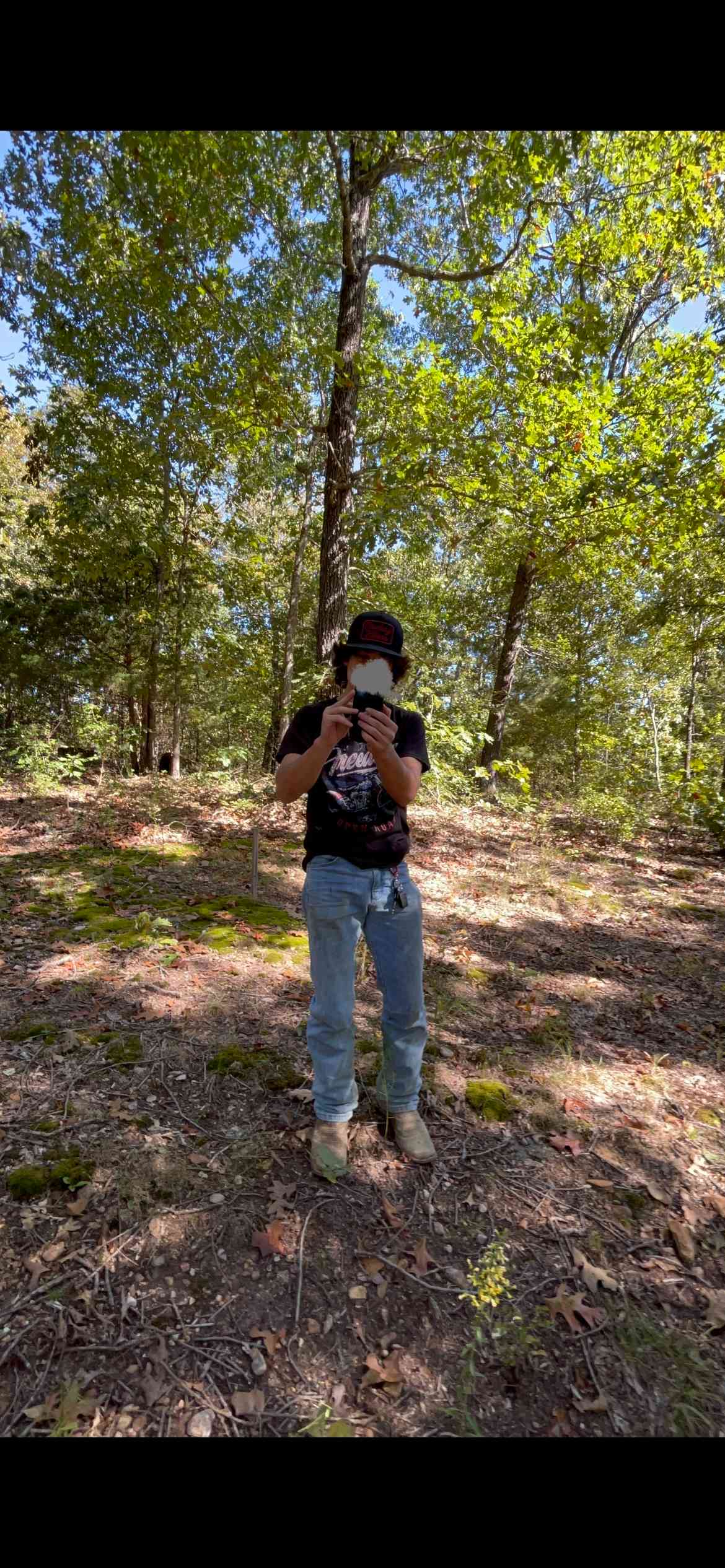 This monkey just jumped down from a tree and took a picture of me!