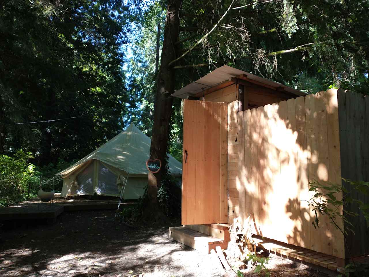Bathhouse with flush toilet + outdoor hot shower