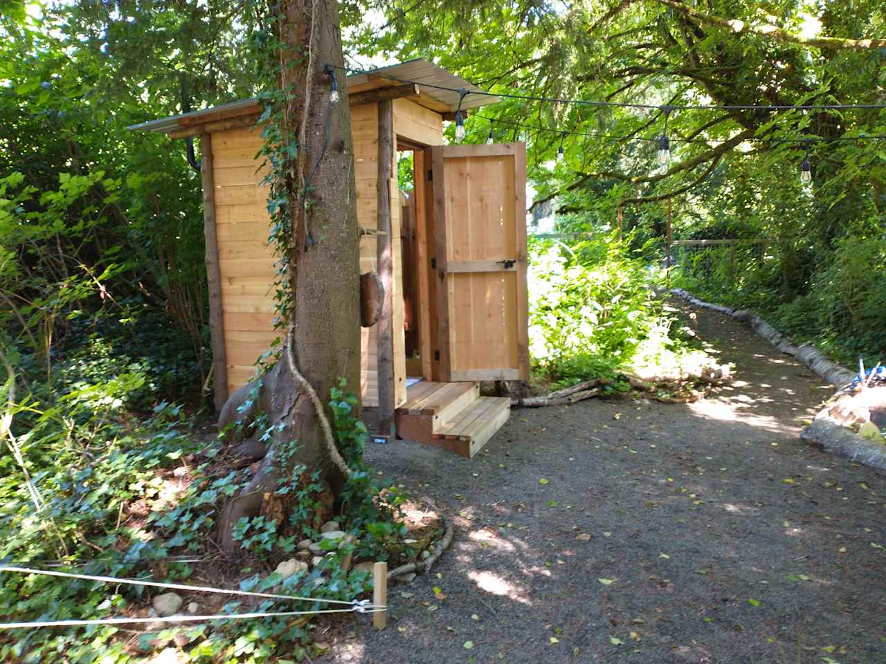 full bathhouse, toilet, shower + sink
