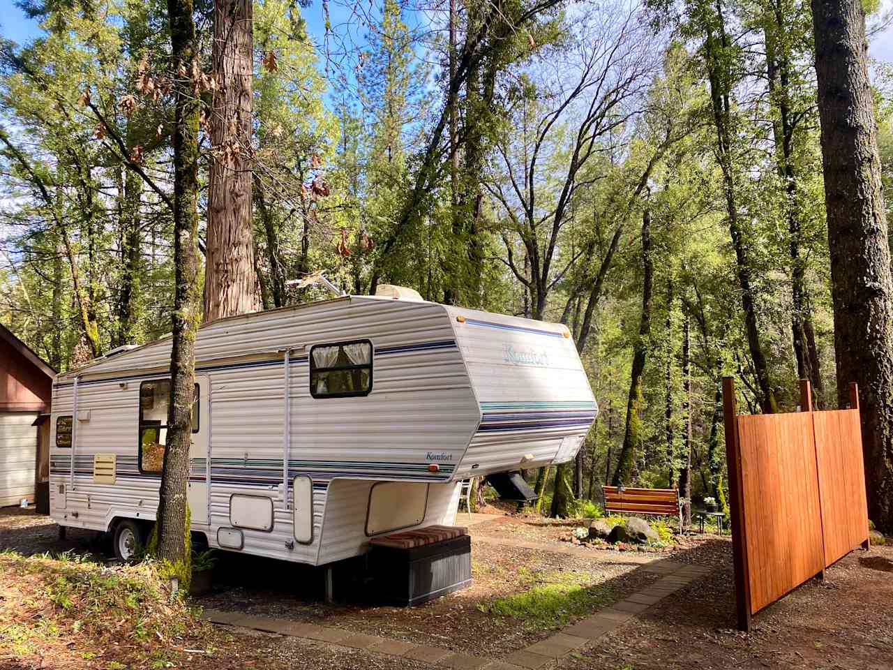 RV overlooks a pond and creek. 

 propane fireplace and outside dining area overlooks the pond. Privacy fence defines your own outdoor space. 
