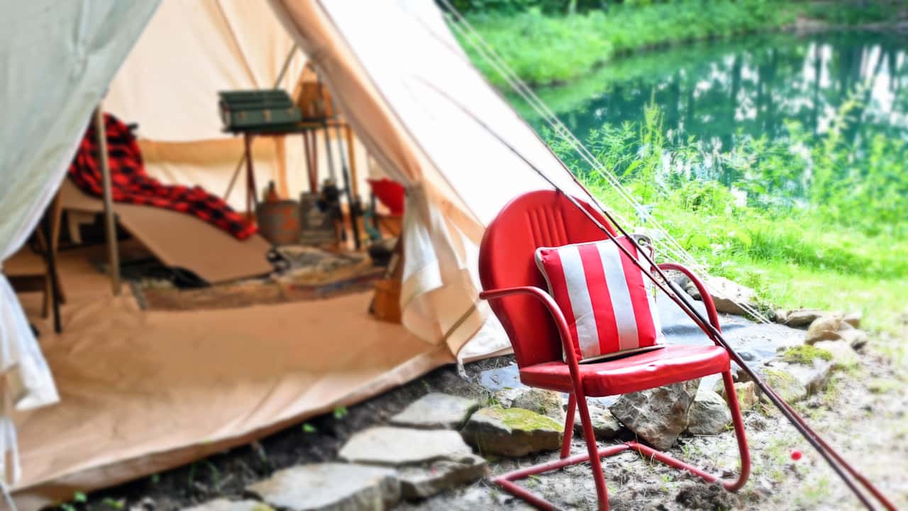 Canvas Cottages Glampers are welcome to visit HQ, the double bell tent by the pond. It will transport you to those retro summer camp days gone by!