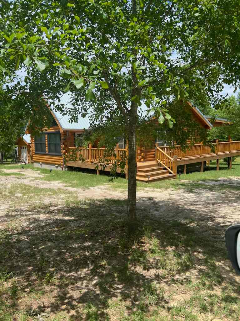 Elegant Log Cabin Creekside