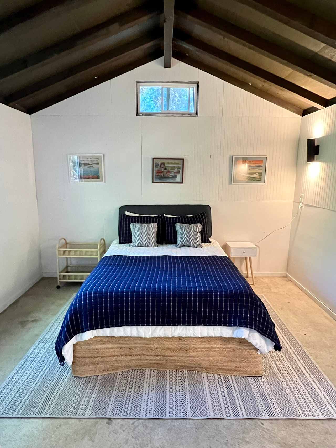 Sleep with this cozy set up just steps from the river!  Comfy queen bed, trundle or cot available.  Cabin stays cool in summer.  Warm blankets and space heaters available in cooler months. 