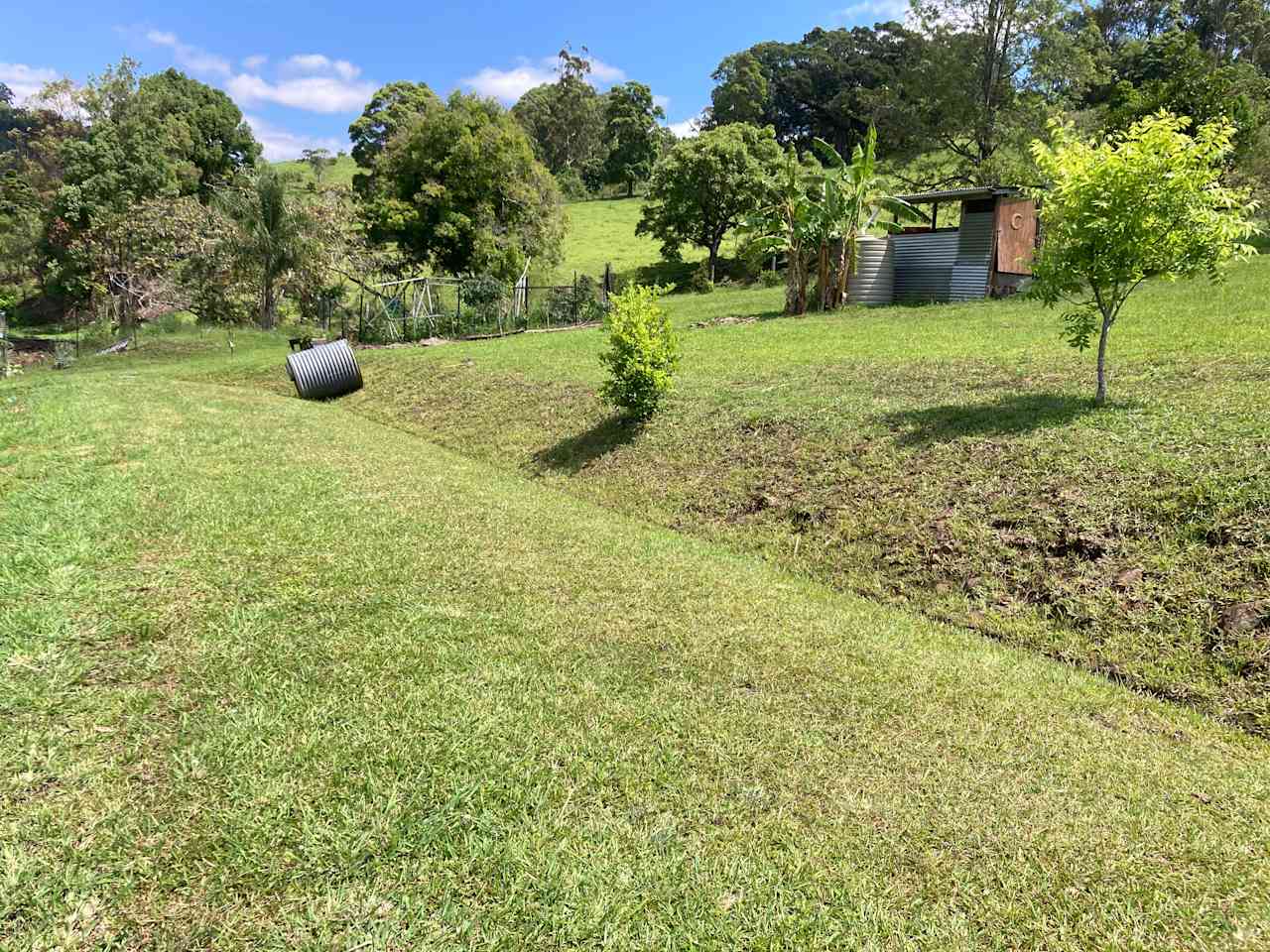 Close-up of Tent Flat with 3 unmarked 4x9m Sites (Far, Middle, Close). Communal veg garden can be seen to the left of the Shower/Toilet Shack.