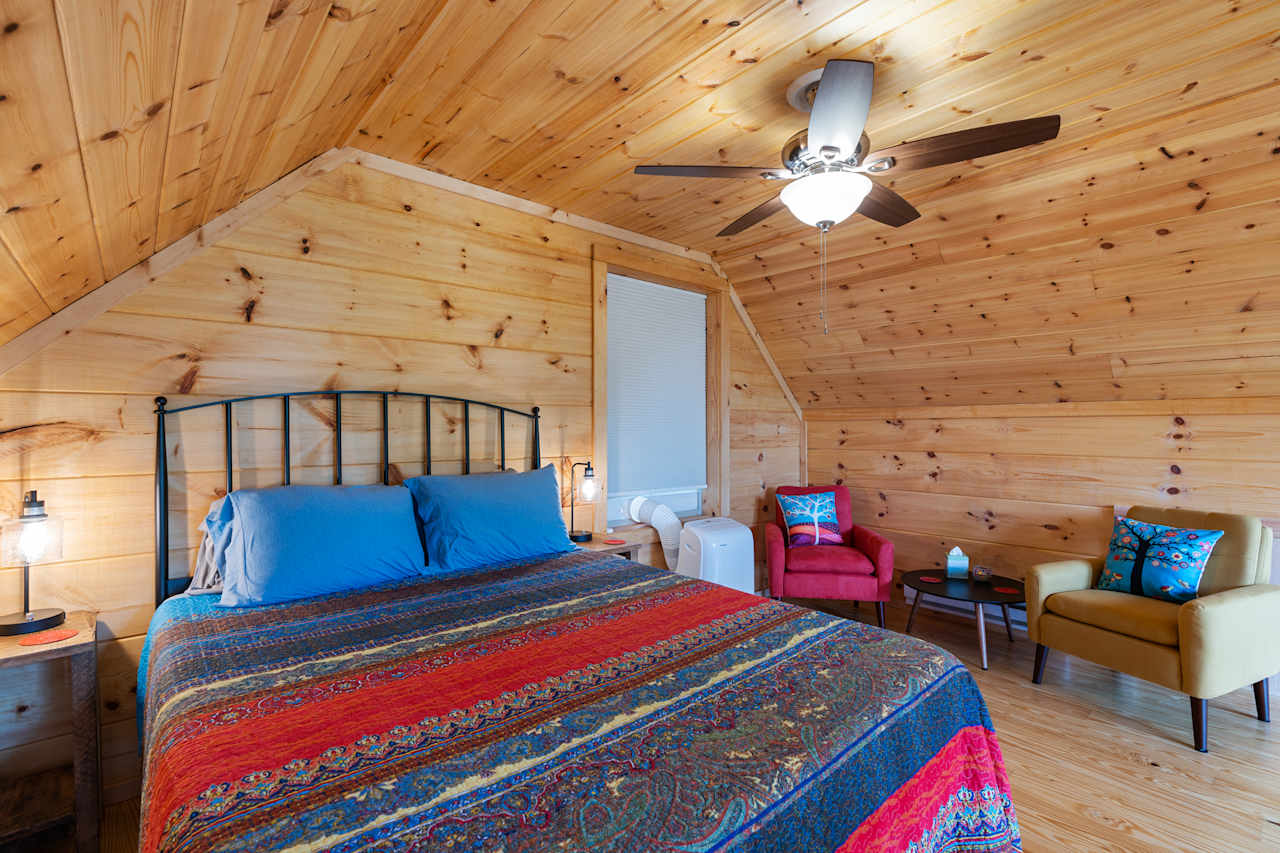 Loft bedroom with seating and mountain views! 