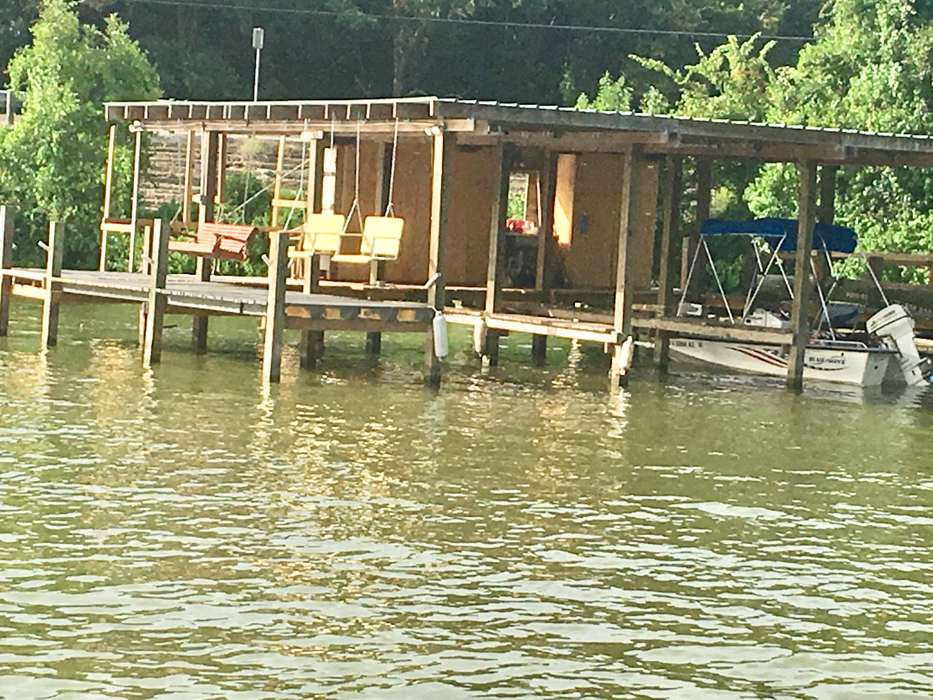 The larger pier with swings, boat house, fishing areas, fish cleaning station, night lights, etc