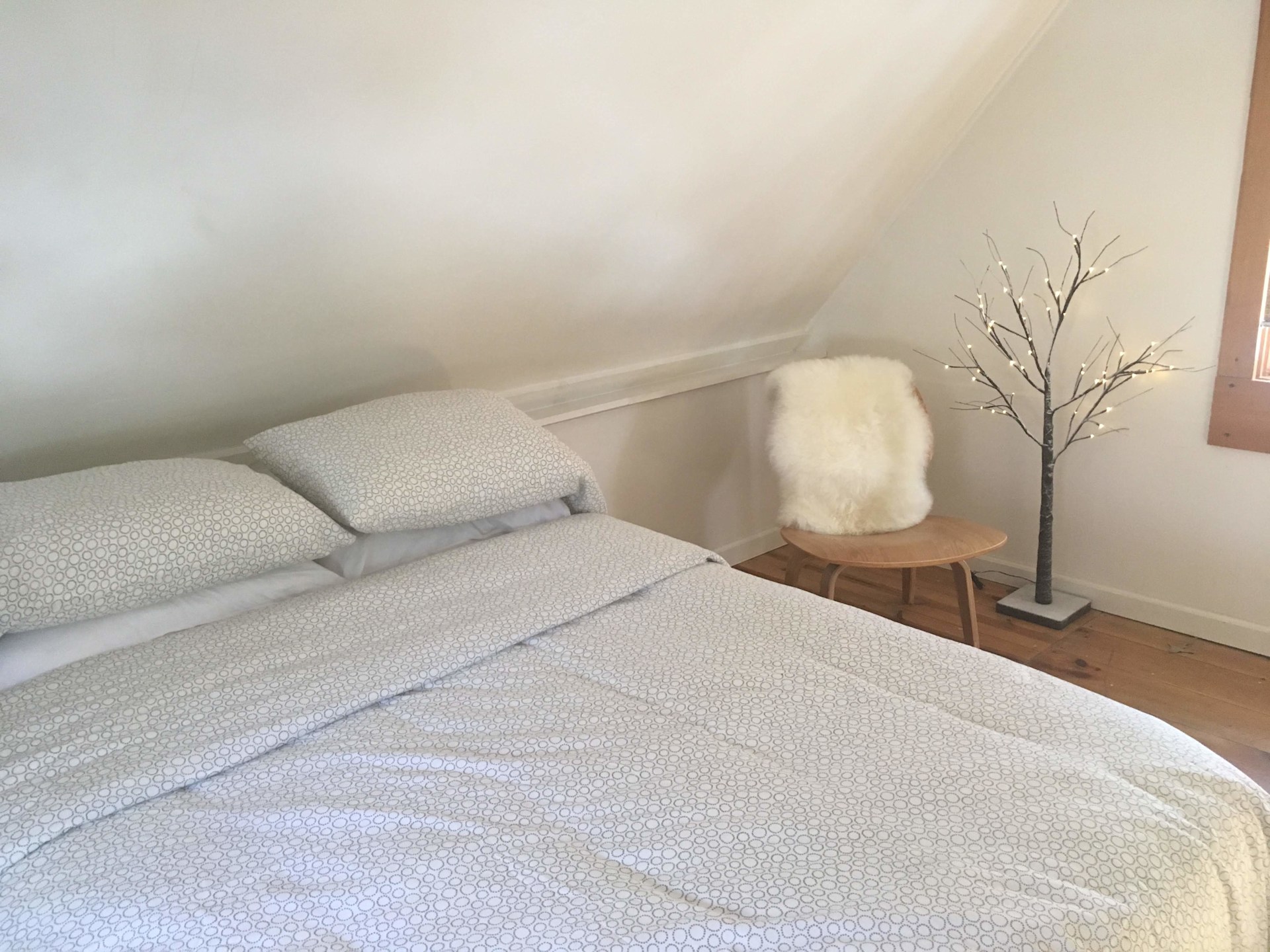 Full size bed in loft.