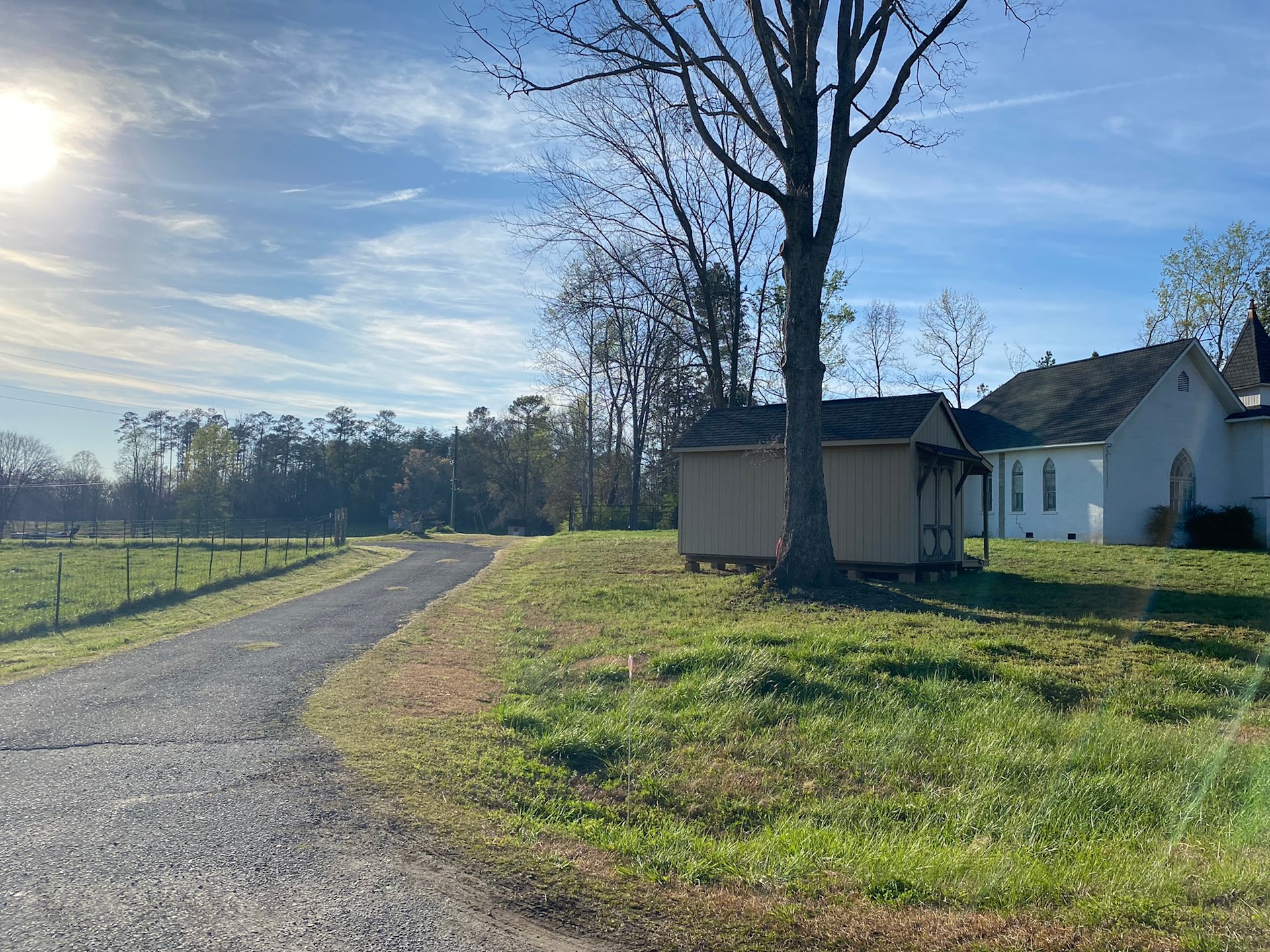 Entrance into drive toward site