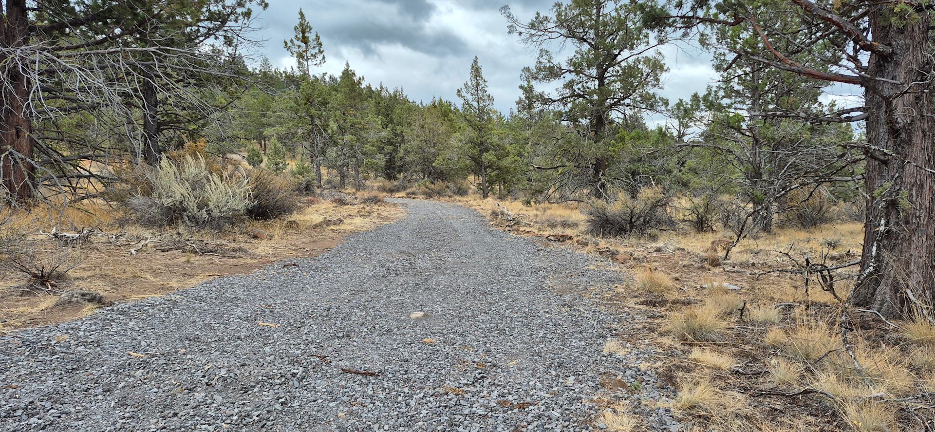 Our entrance to the land and rv/tent sites are gravel.  Site 1 is rv, 5th wheel only.  Site 2 is rv, 5th wheel and tent. 