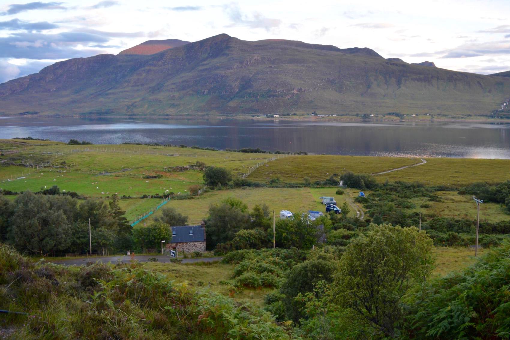Grass pitch with Electric Hookup. Perfect for campervan camping in Scotland. 
