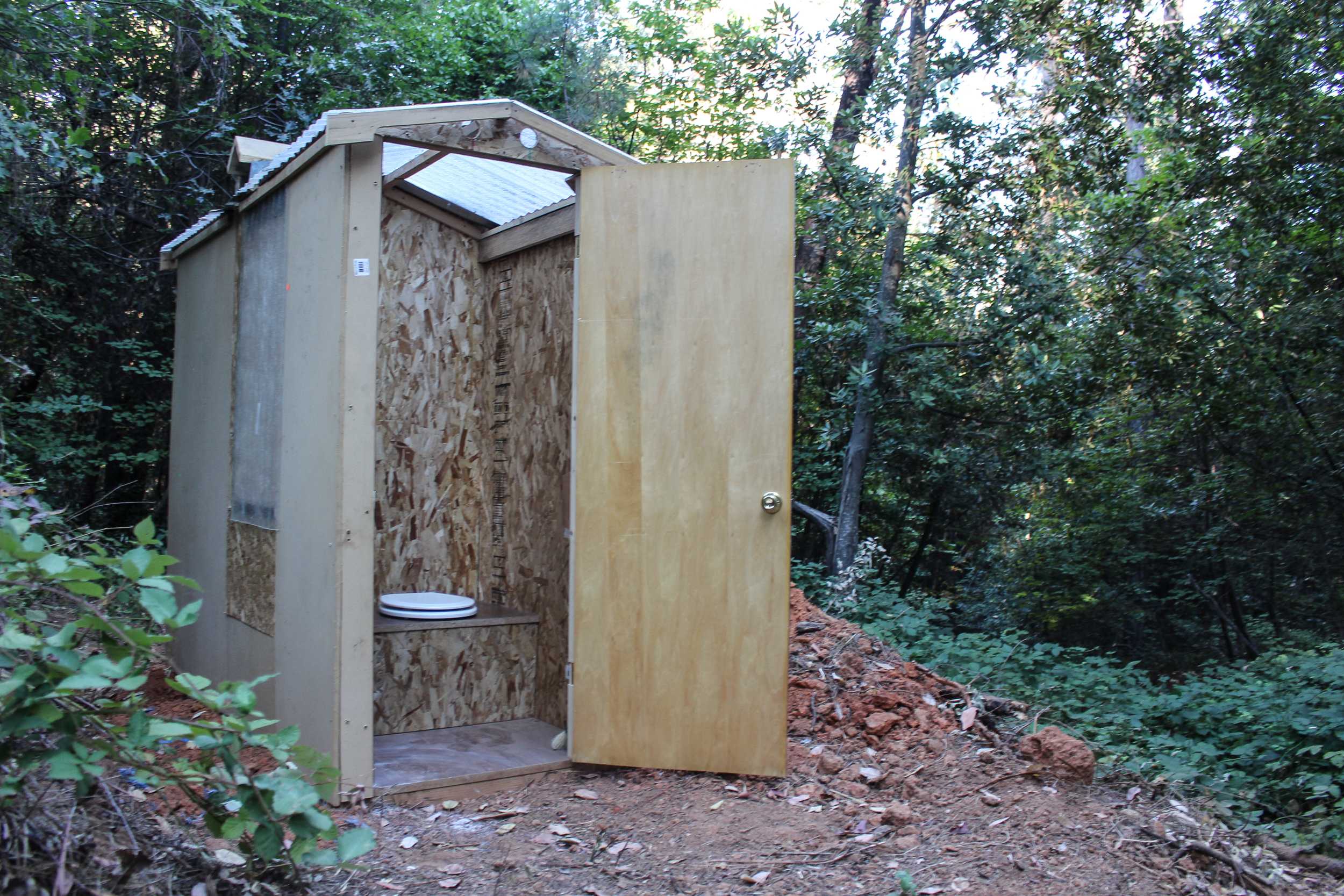 Brand new, spotless, spacious, well-lit (assuming it's daytime otherwise bring a headlamp). They are placed slightly away from camp (awesome for privacy)  but it's just a short walk and very convenient.