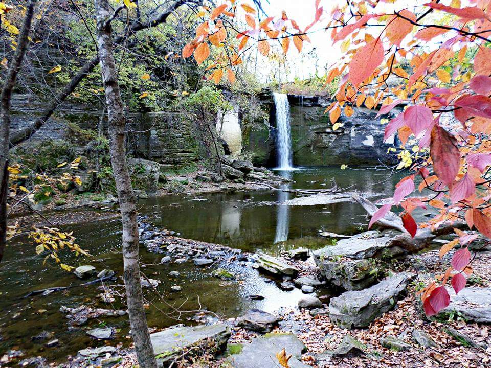 If you venture off the beaten path , you may end up here , with views of the breathtaking waterfall . You can get close enough to touch it , if you wish . 
