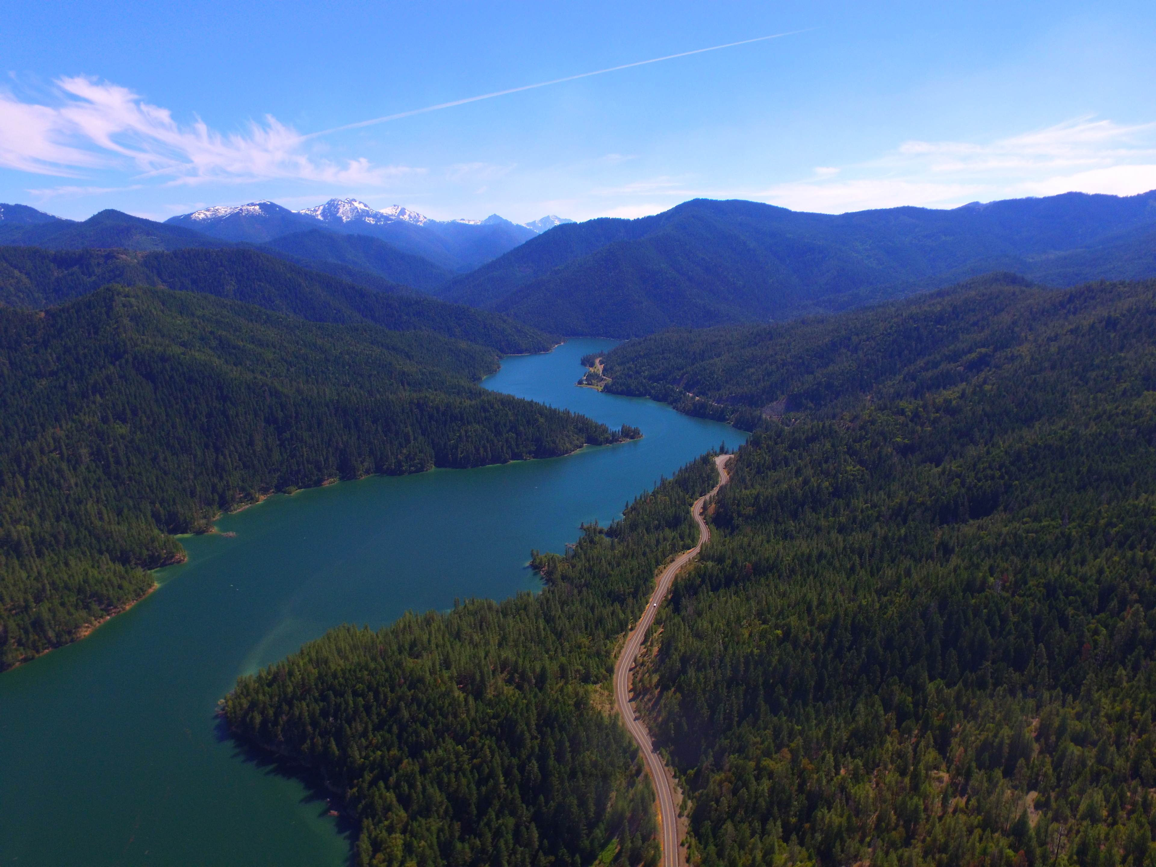 Overlooking Applegate Lake at 900 ft. In the distance you can spy the summer snow still in the peaks of Rattlesnake Mt., Kangaroo Mt., and Red Butte. 