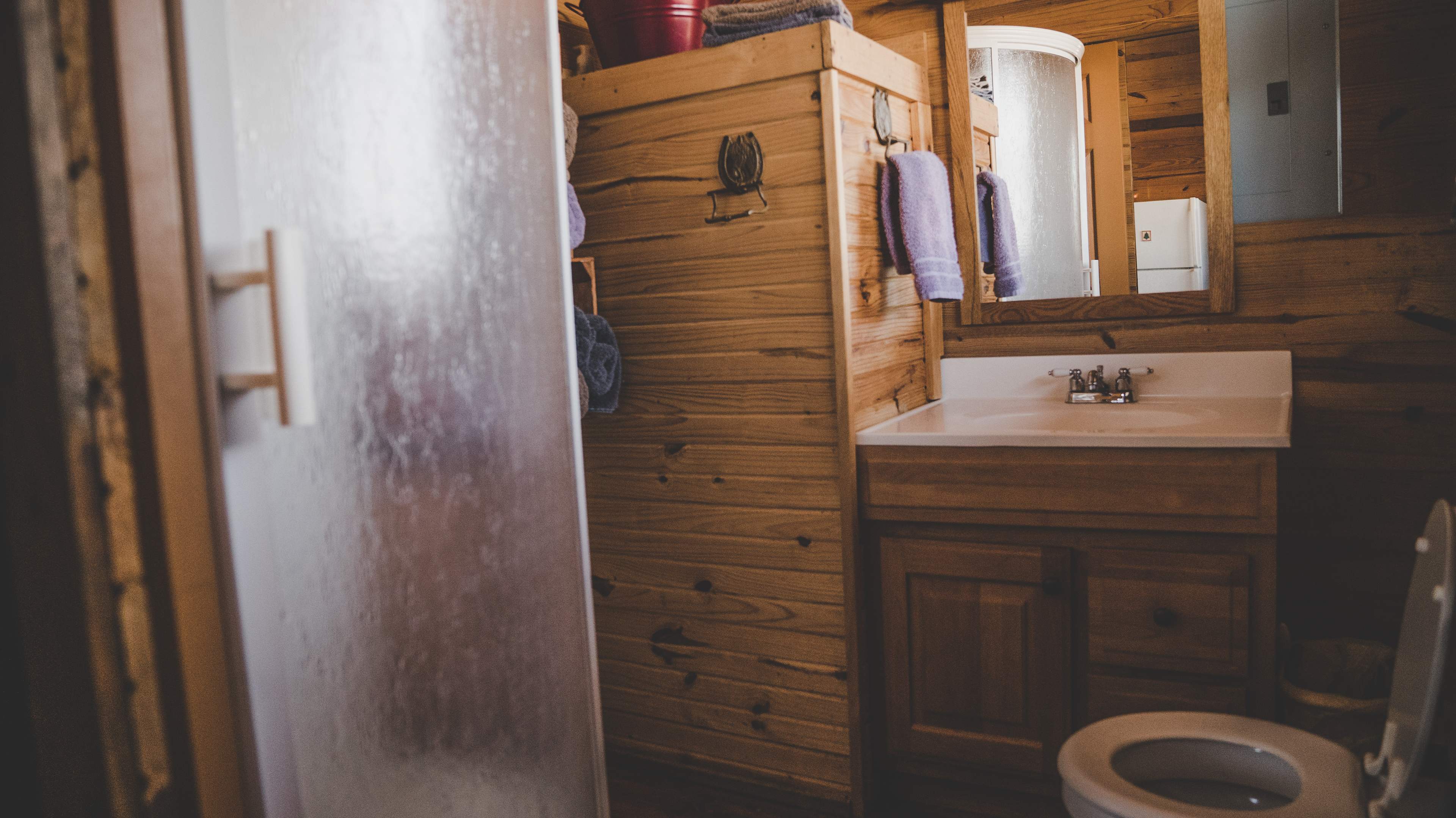 Full bath downstairs with running water, toilet and shower.
