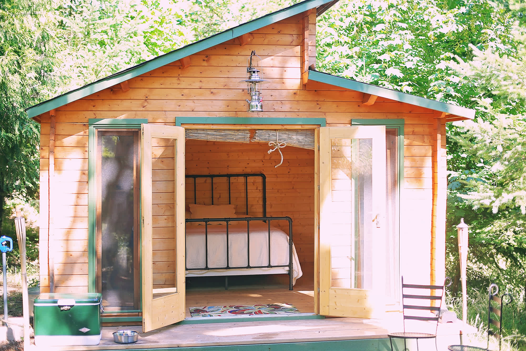 The quaint cabin that rests in 20 acres of beautiful lush property