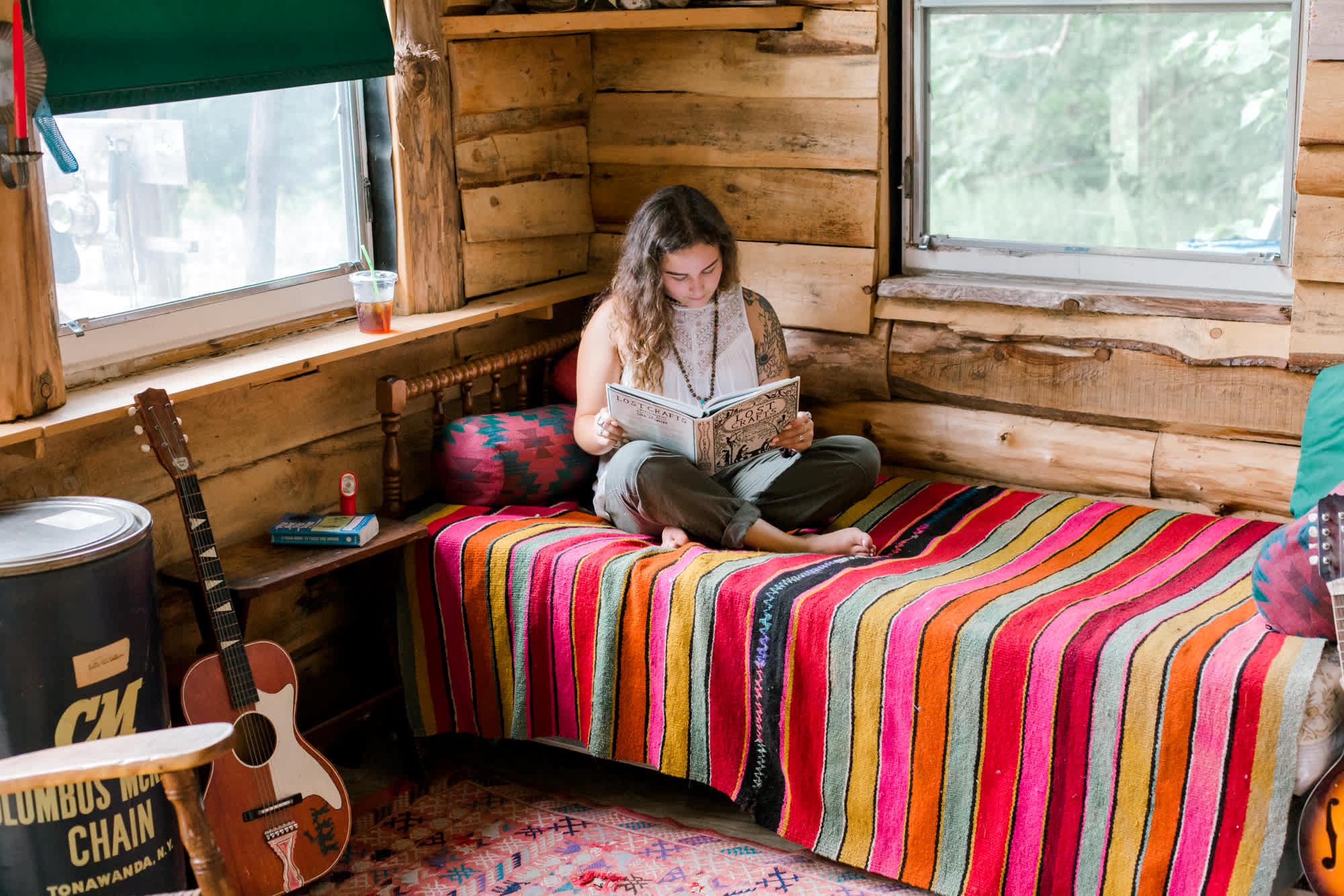 Bed in the first room of the cabin