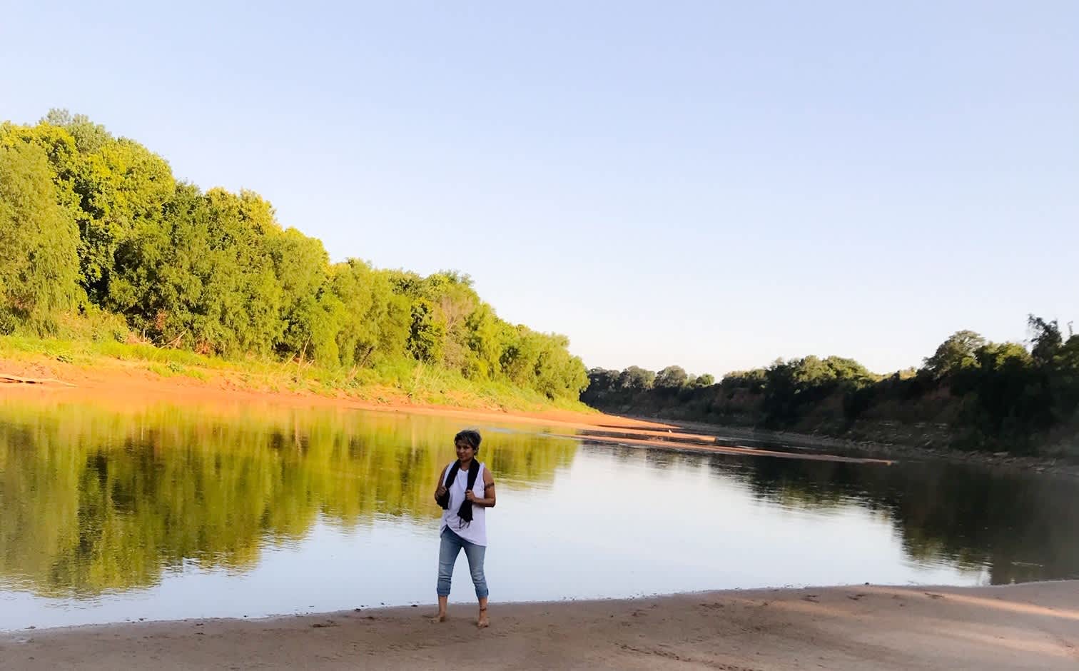 Red River beach walking, sand in your toes, when the river is down.