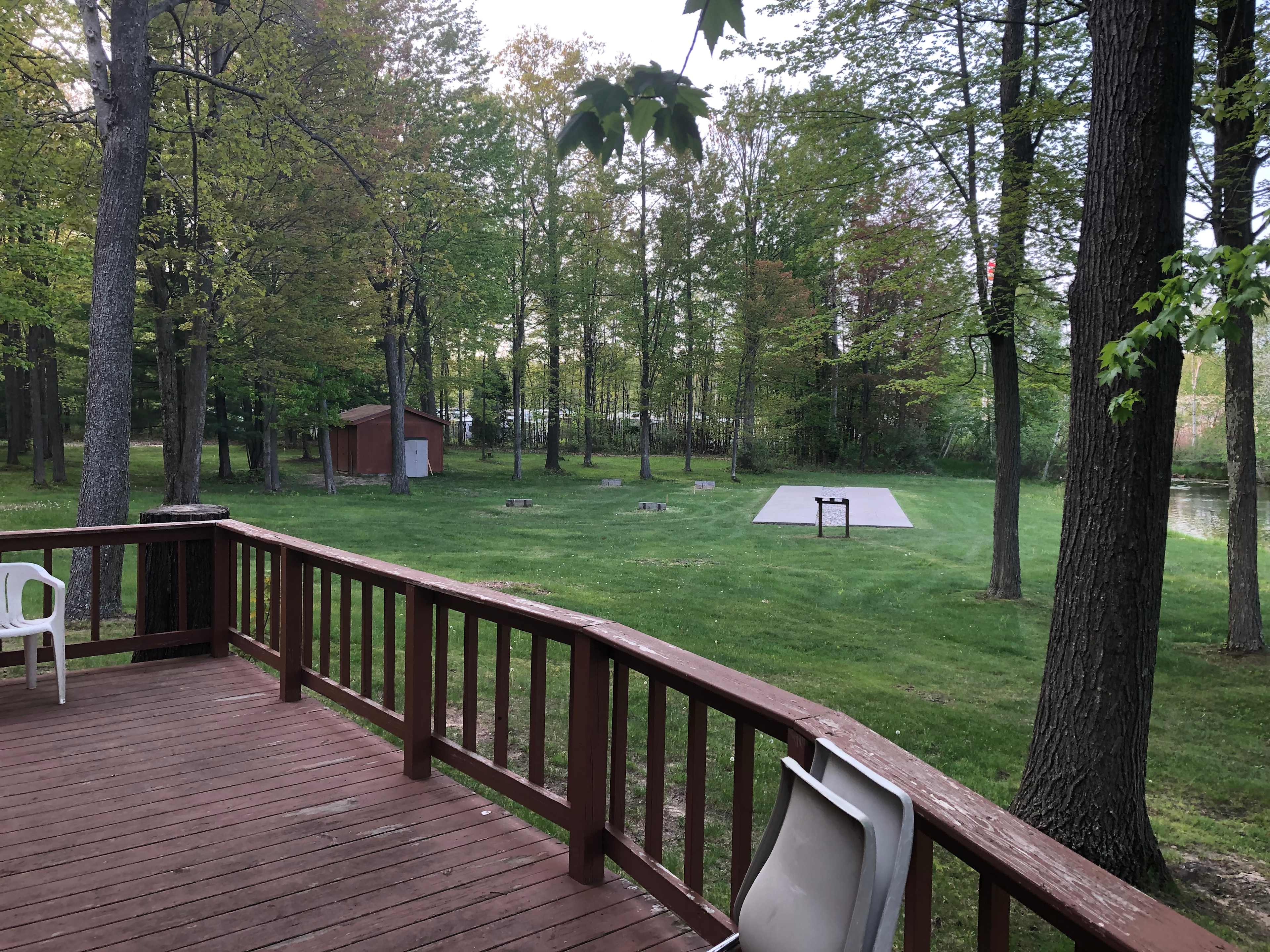 Horse shoe pits and shuffle boards from back of club house 