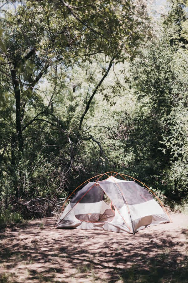 The tent was STEPS away from the most peaceful water