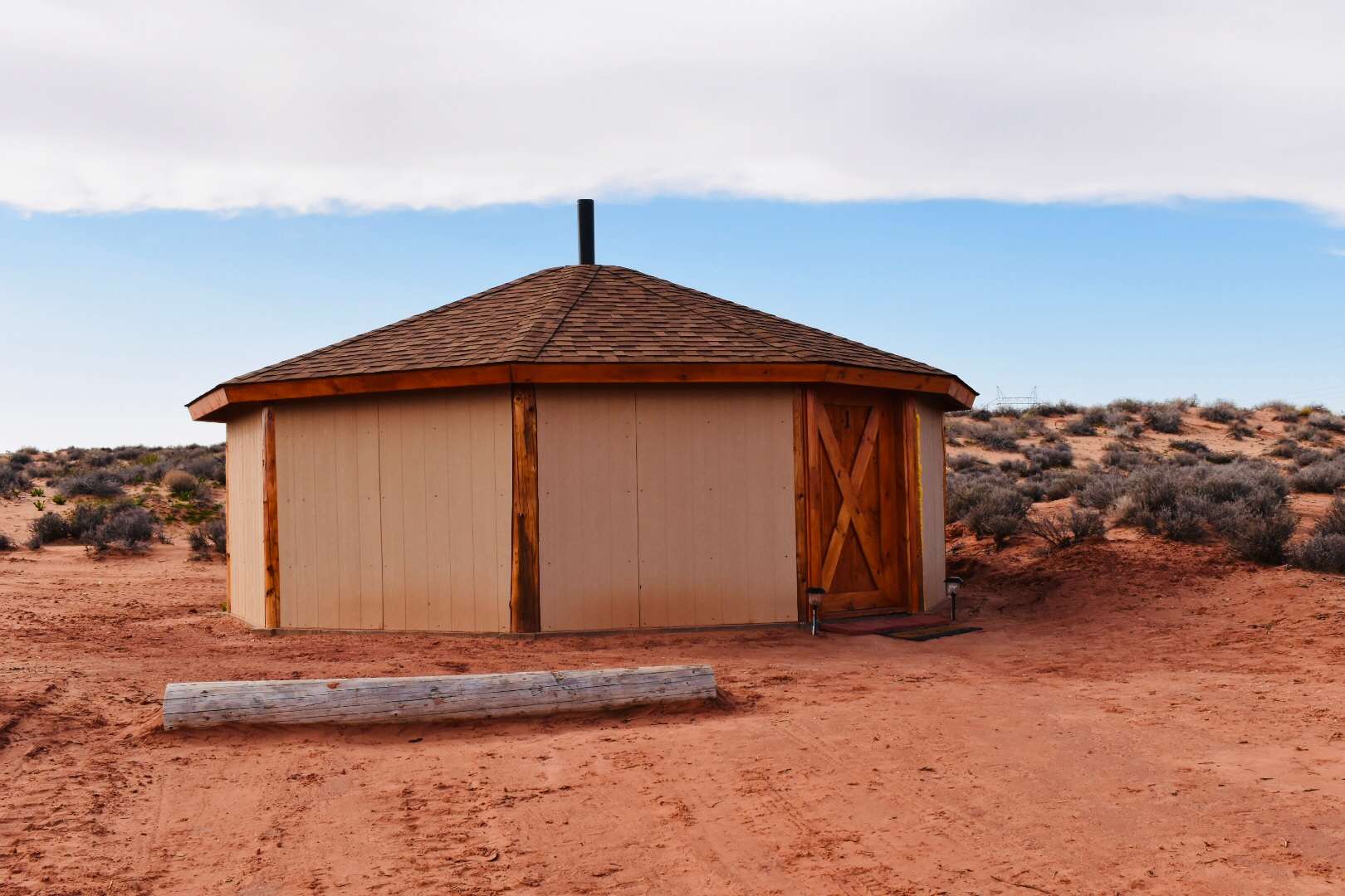 Front entrance and parking area of the Navajo Hogan.