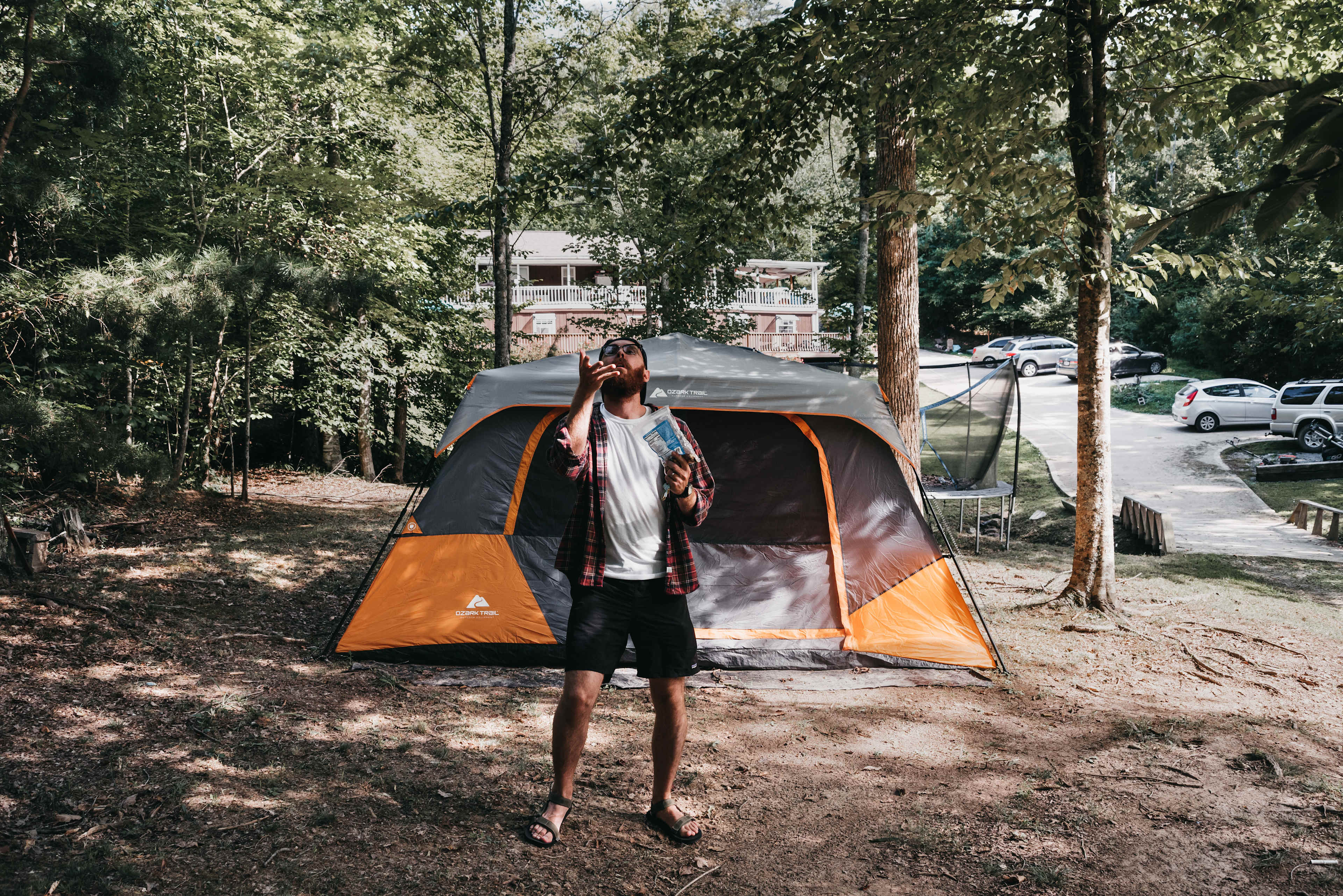 Catching peanuts at one of the tent sites in the trees.