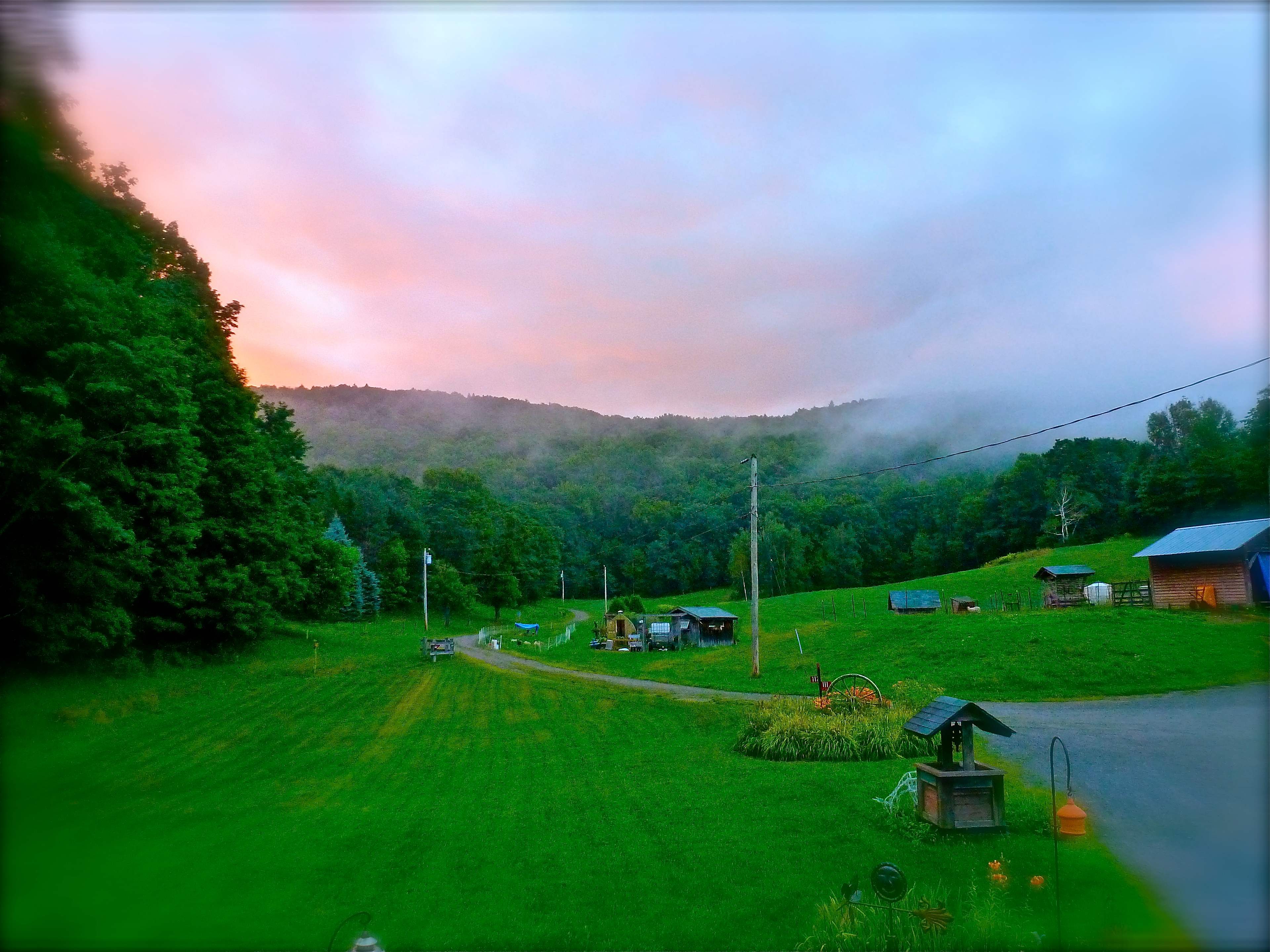 A beautiful foggy morning as the sun comes up.