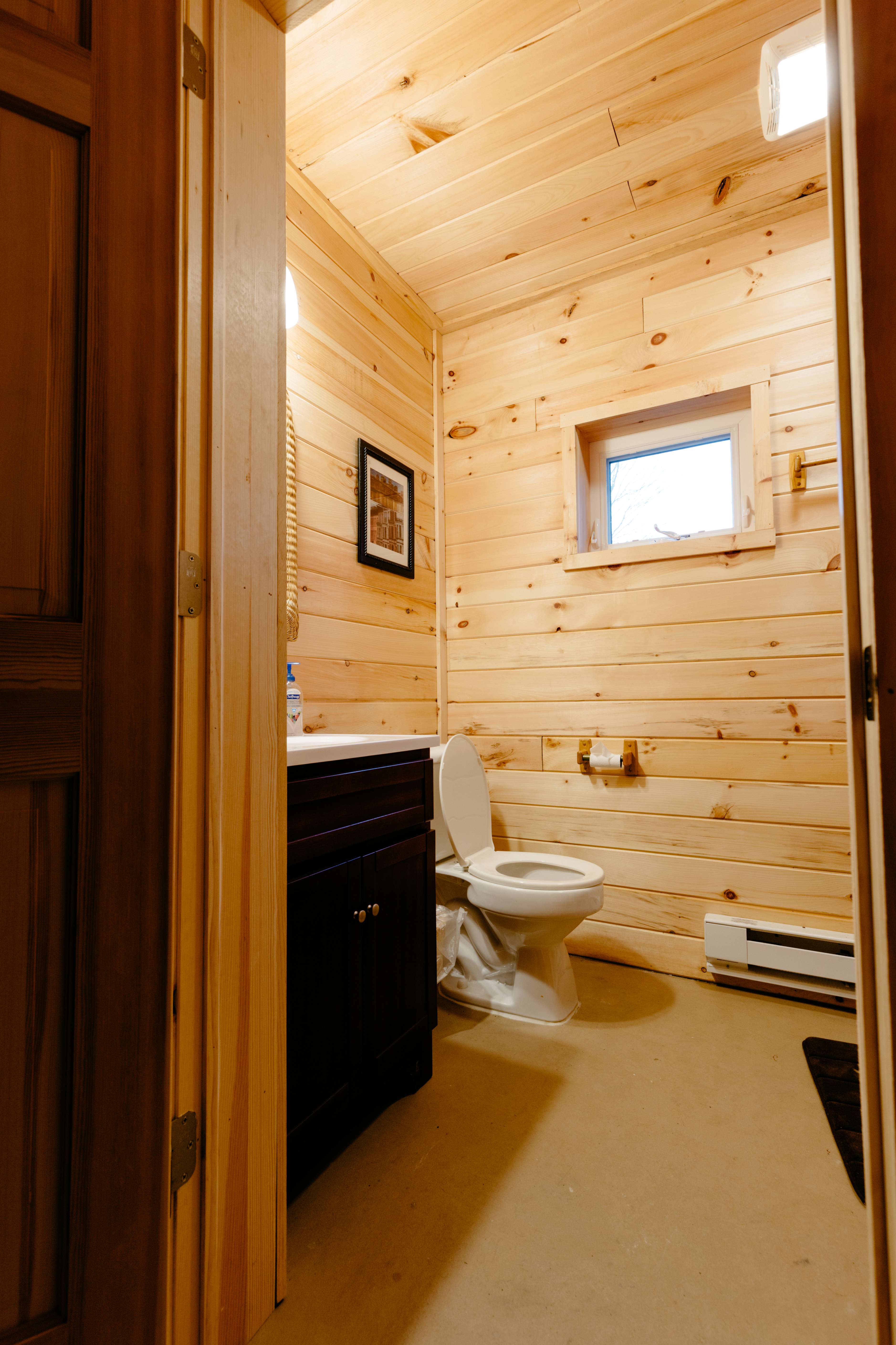 Each cabin has a full bath inside, including a stand up shower,