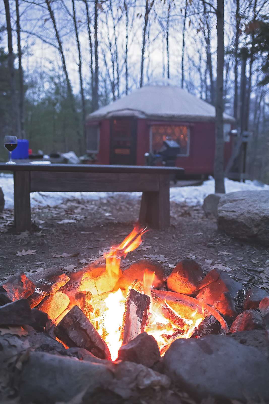 Enjoying a fire outside Trailside Yurt