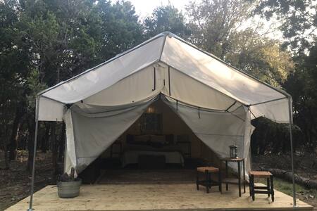 This high-quality canvas tent measure 14' wide x 16' deep, not including the porch.