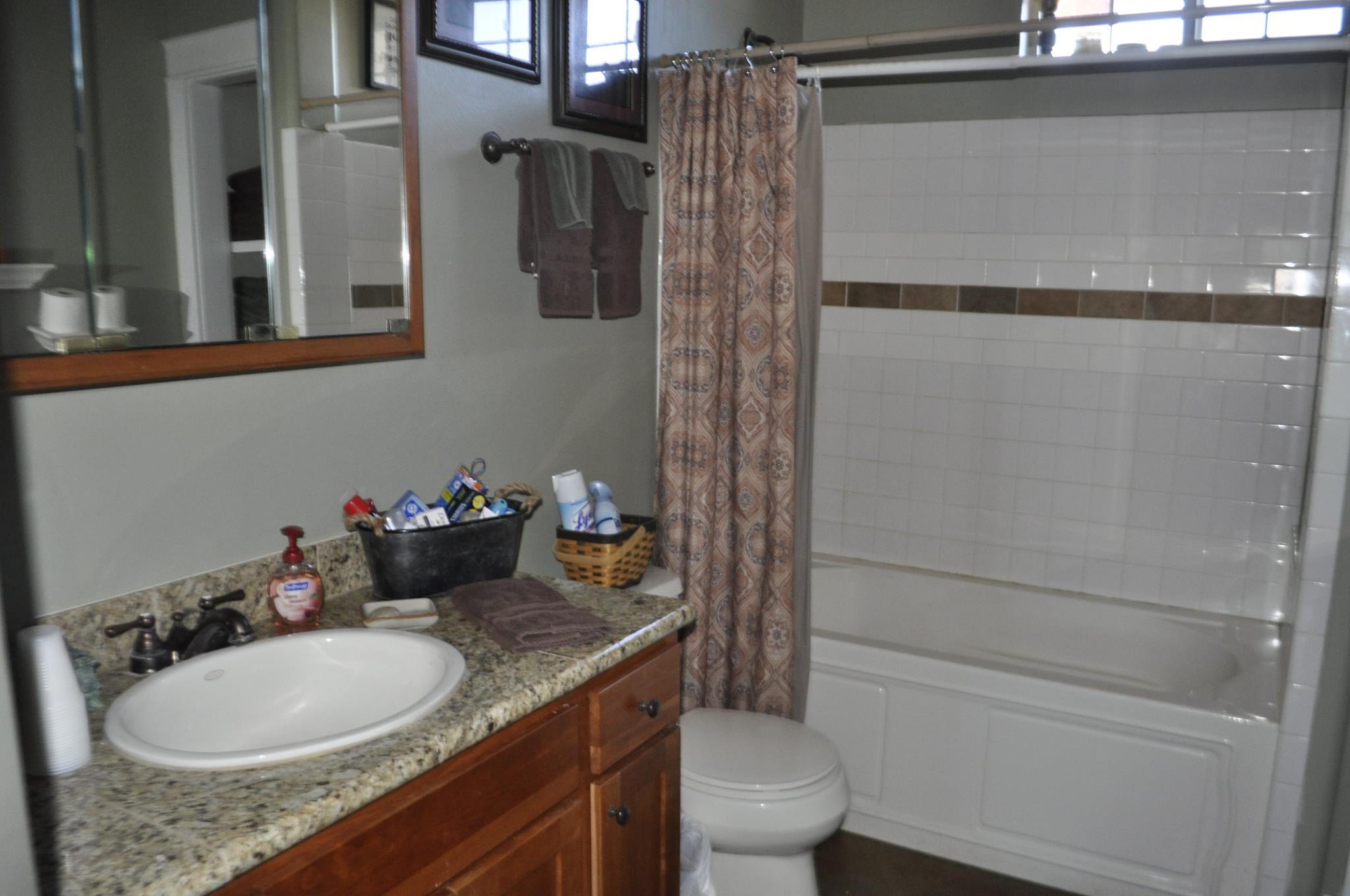 RESTROOM:
This is a shared shower/toilet with other guests unless you have reserved the entire private wing. Be mindful of your time and respect that others are sharing this space. There is a lock on the door for your privacy. Towels, washcloths, blow dryer, 
