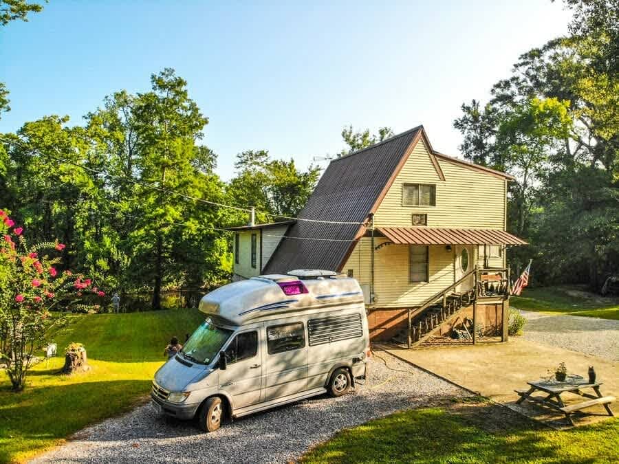 Street view; campsite has  water view and access.  Grassy area for children to roam. It has a 30 & 50 amp electric option.