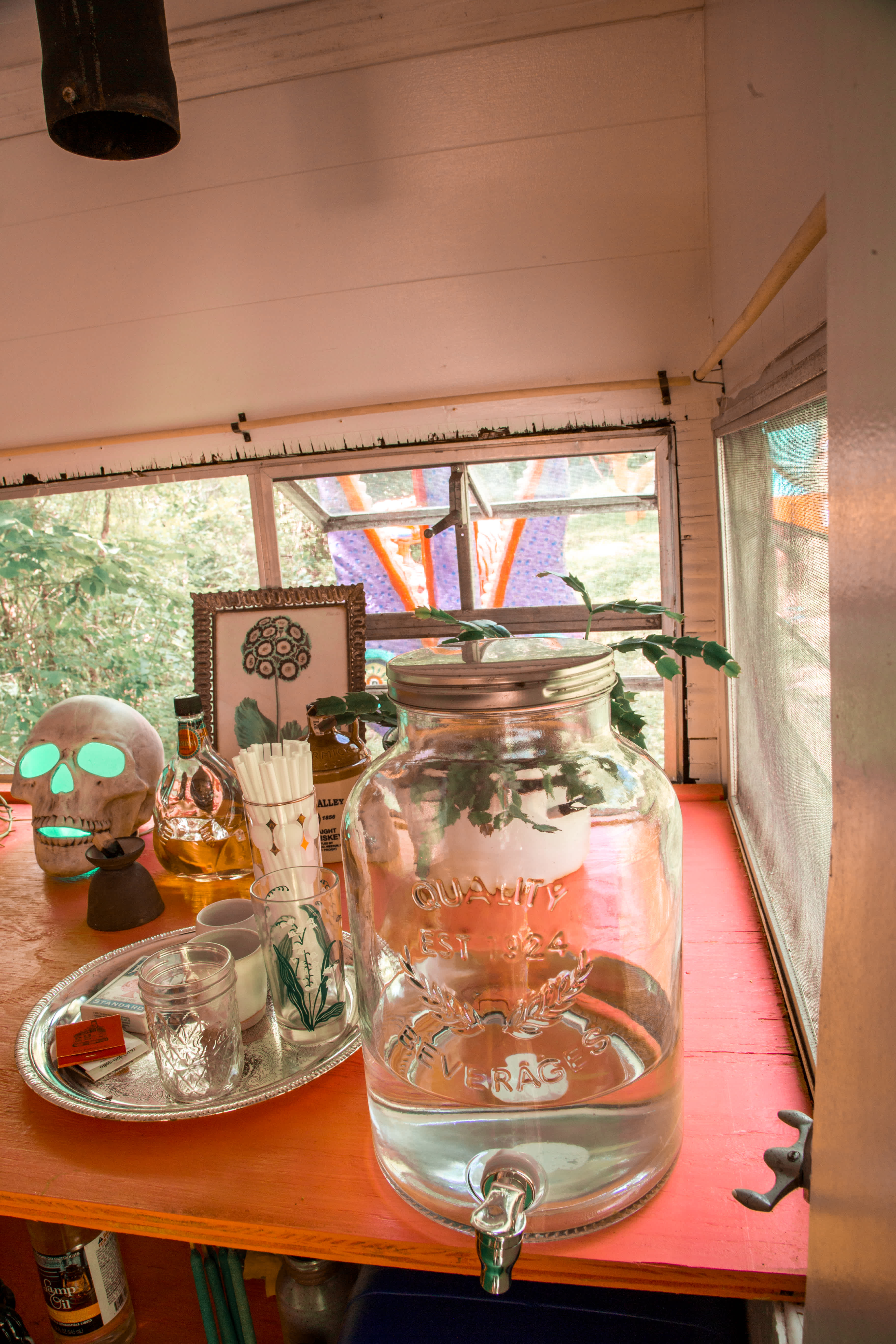 A glass jug for drinking water. We will provide some for you upon arrival. 