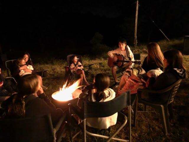 Sitting around the campfire. Bring your chairs.
