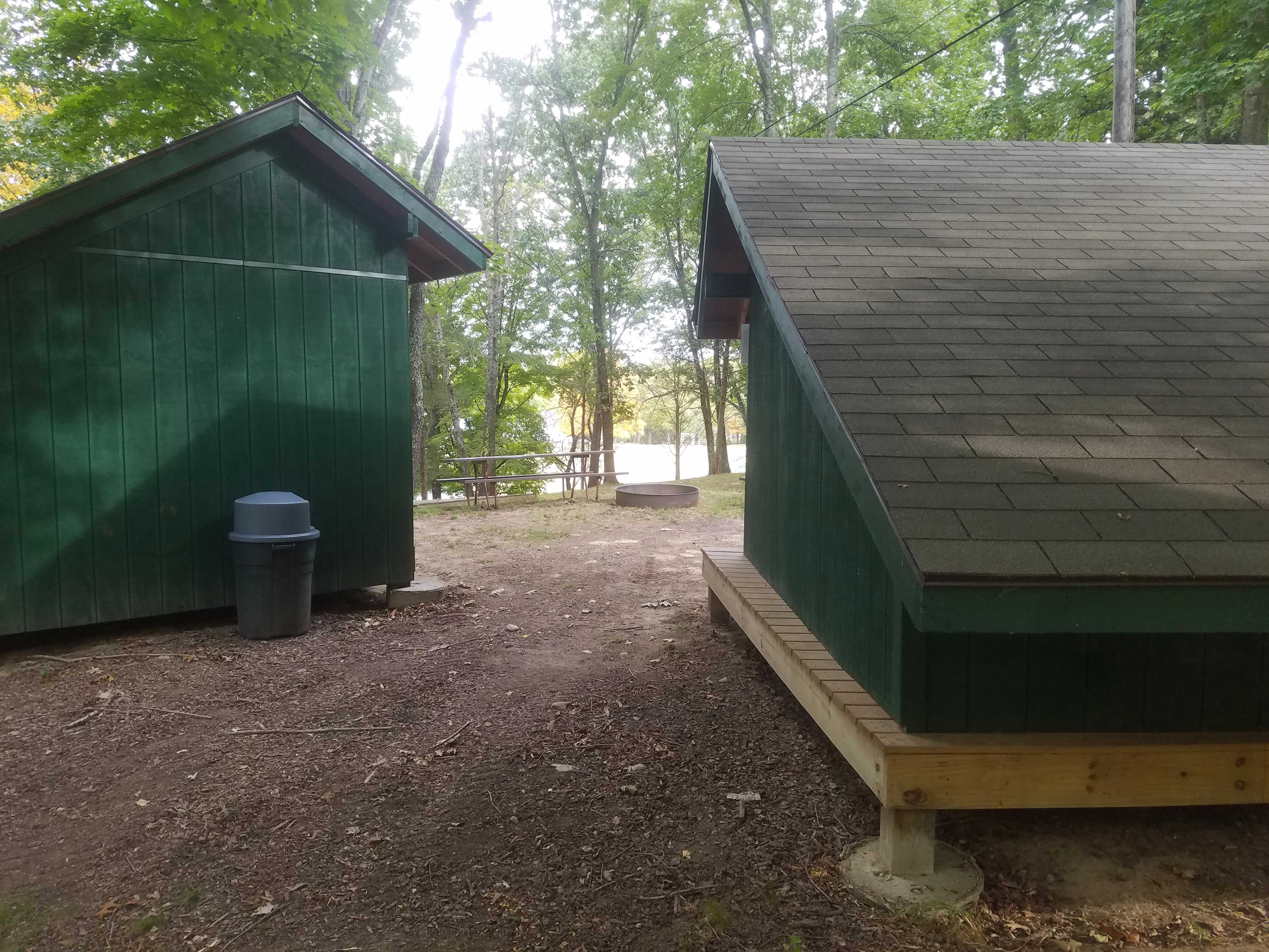 Fire Pit, Picnic Tables and Rubbish Barrel provided