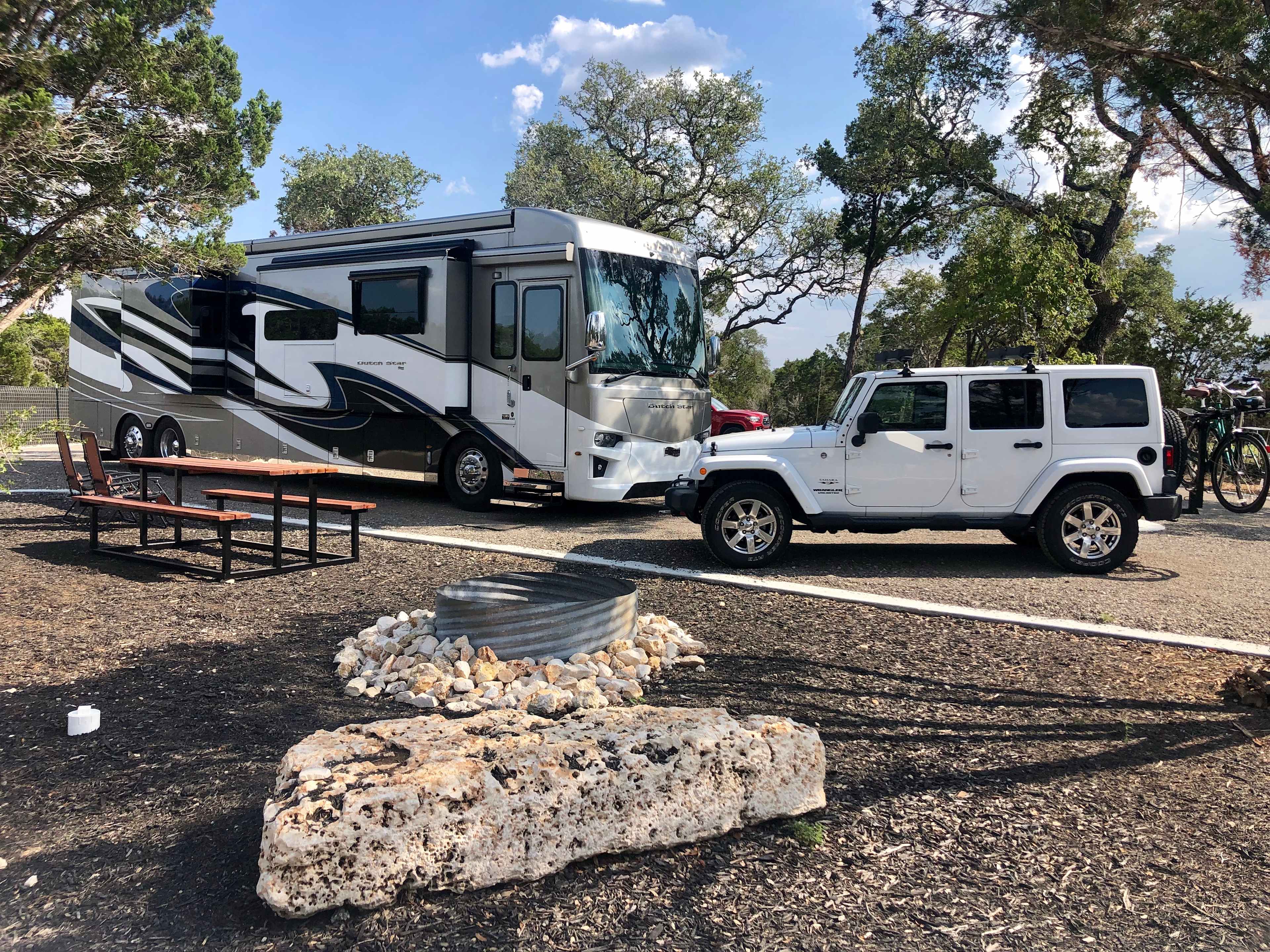 Premium RV Site 5 is Big Rig friendly! It has it's own natural area with fire pit and picnic table.
