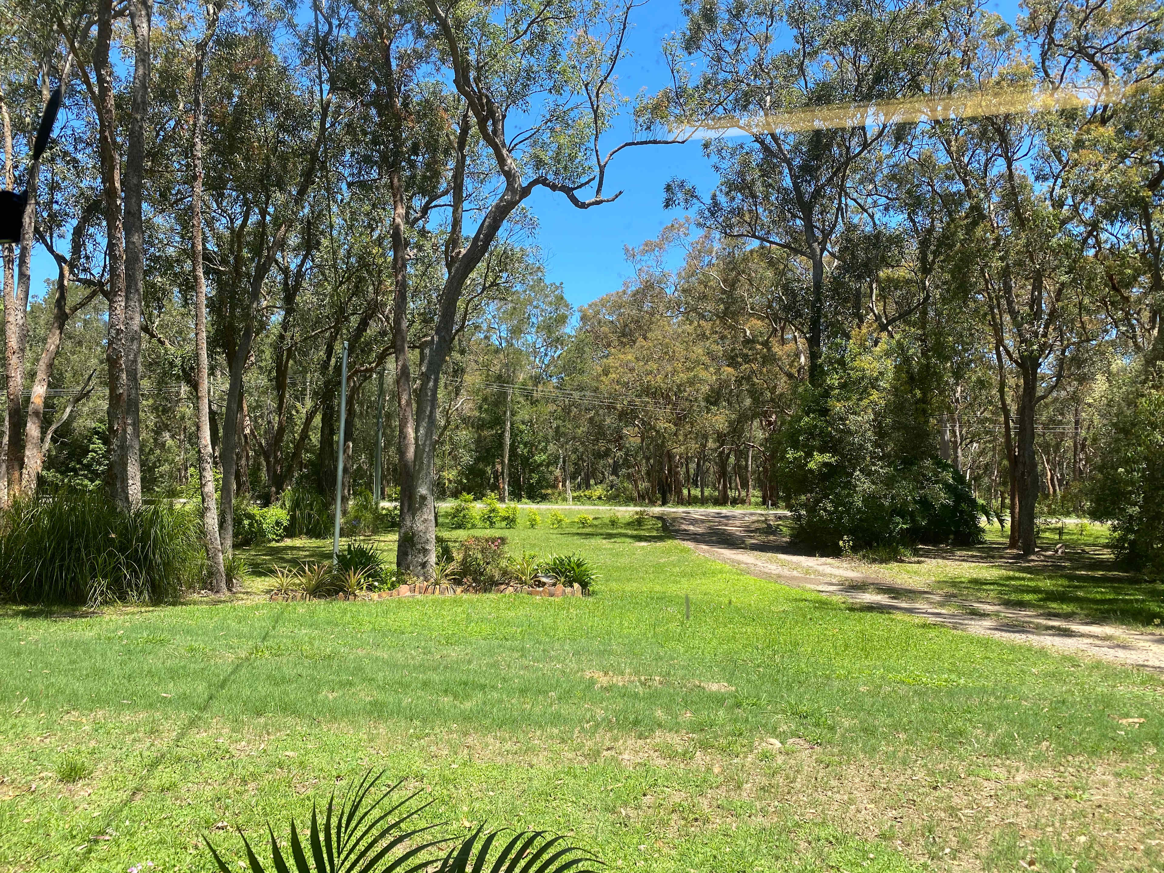 The front of the property from the house. Bush across the road and surrounds. 