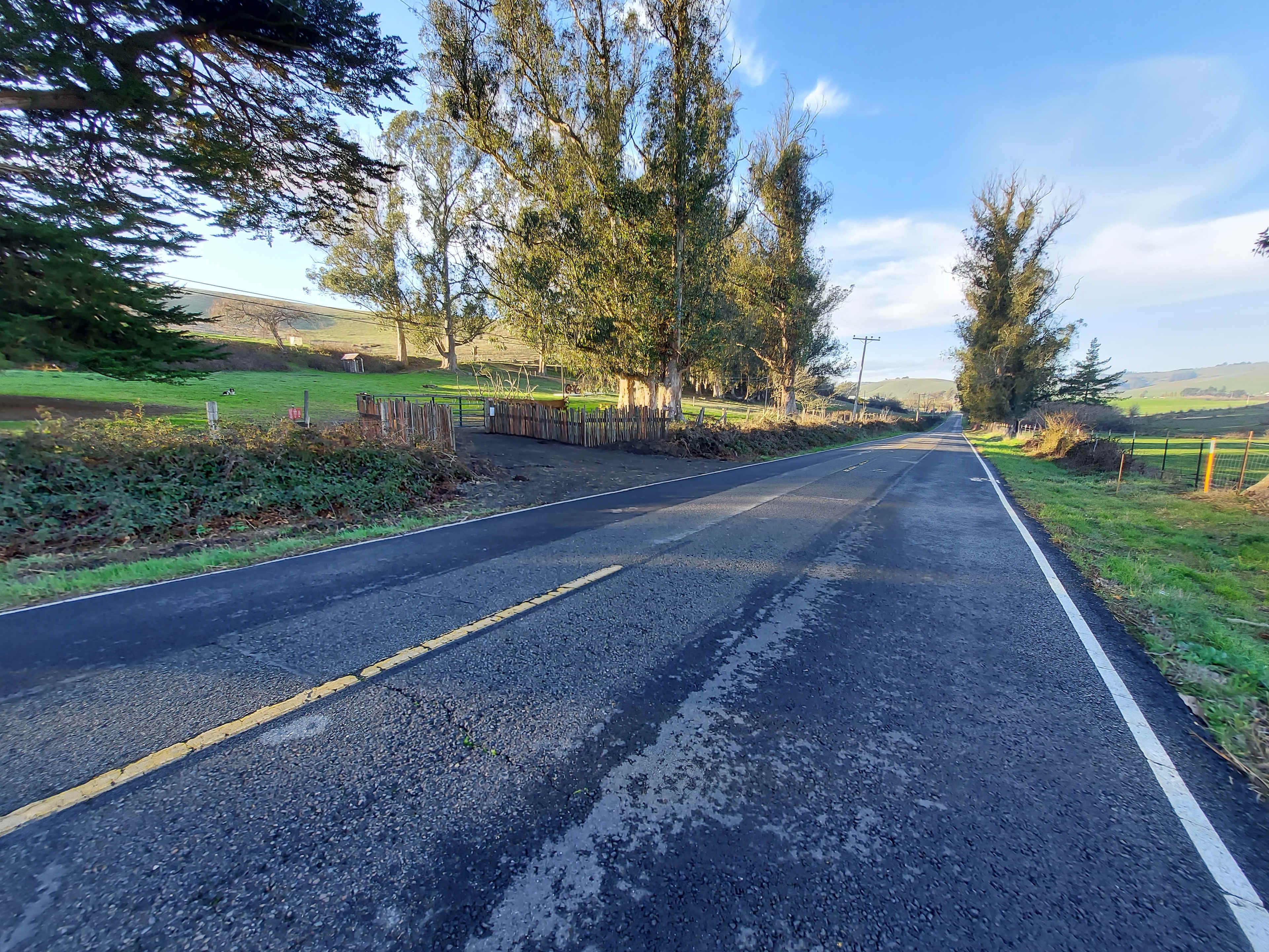 View of the driveway entrance coming from the south